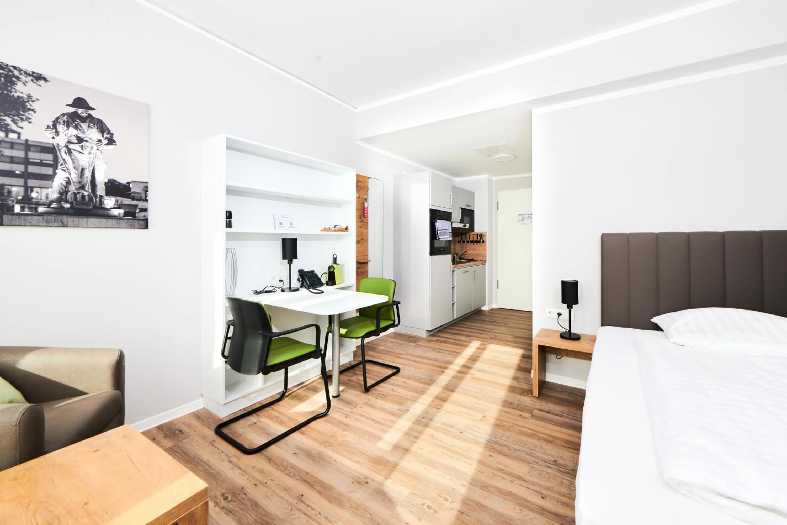 Bed in ADAPT APARTMENT HOTEL Siegen