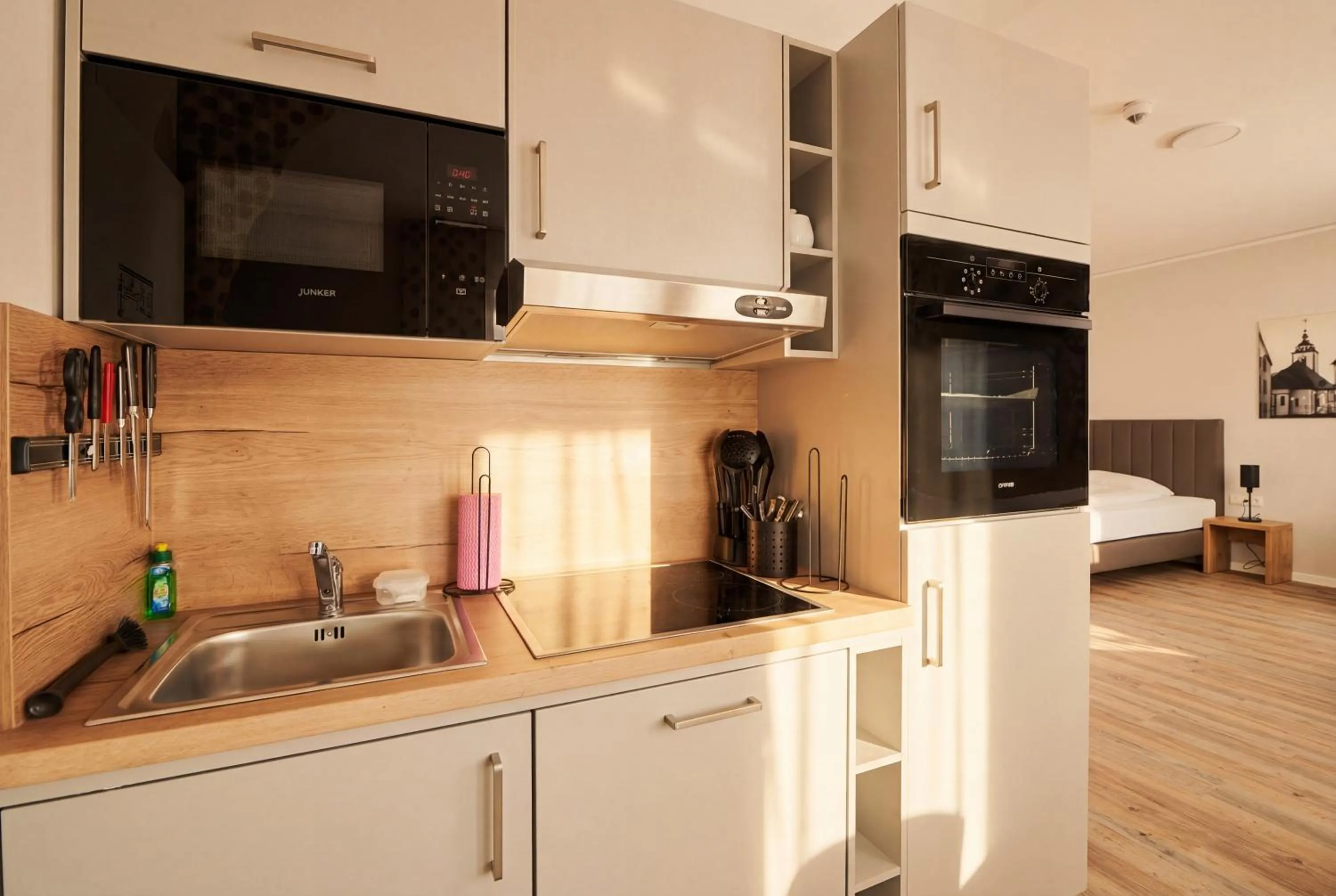 Kitchen or kitchenette in ADAPT APARTMENT HOTEL Siegen