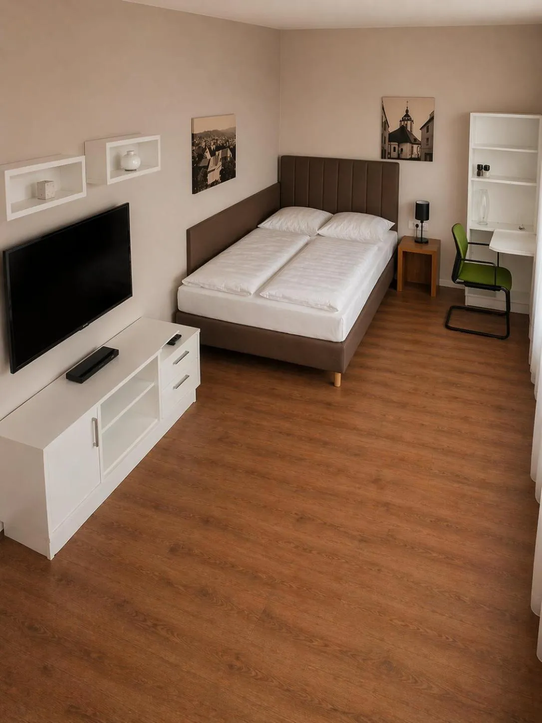 Bed in ADAPT APARTMENT HOTEL Siegen