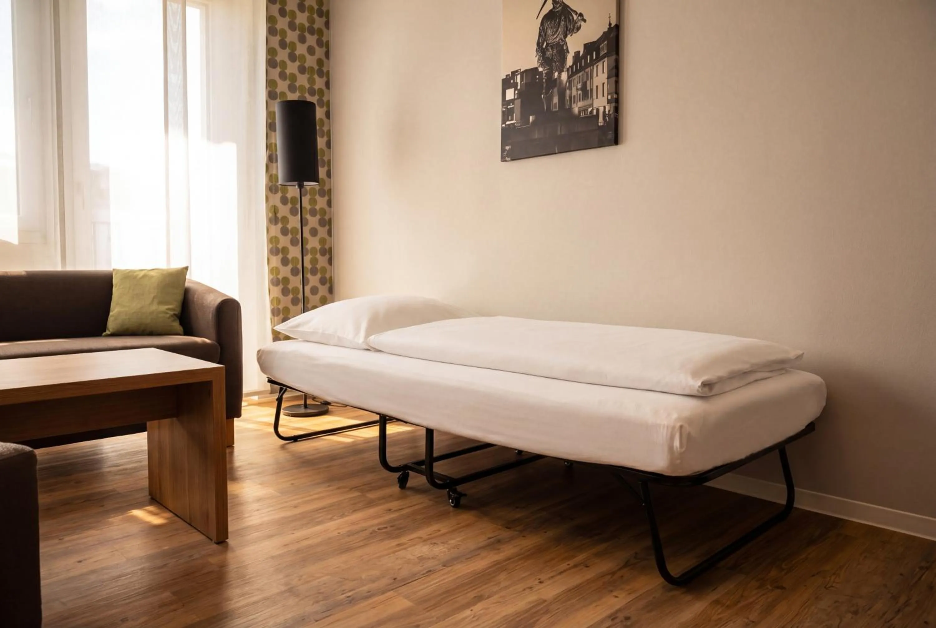 Bed in ADAPT APARTMENT HOTEL Siegen