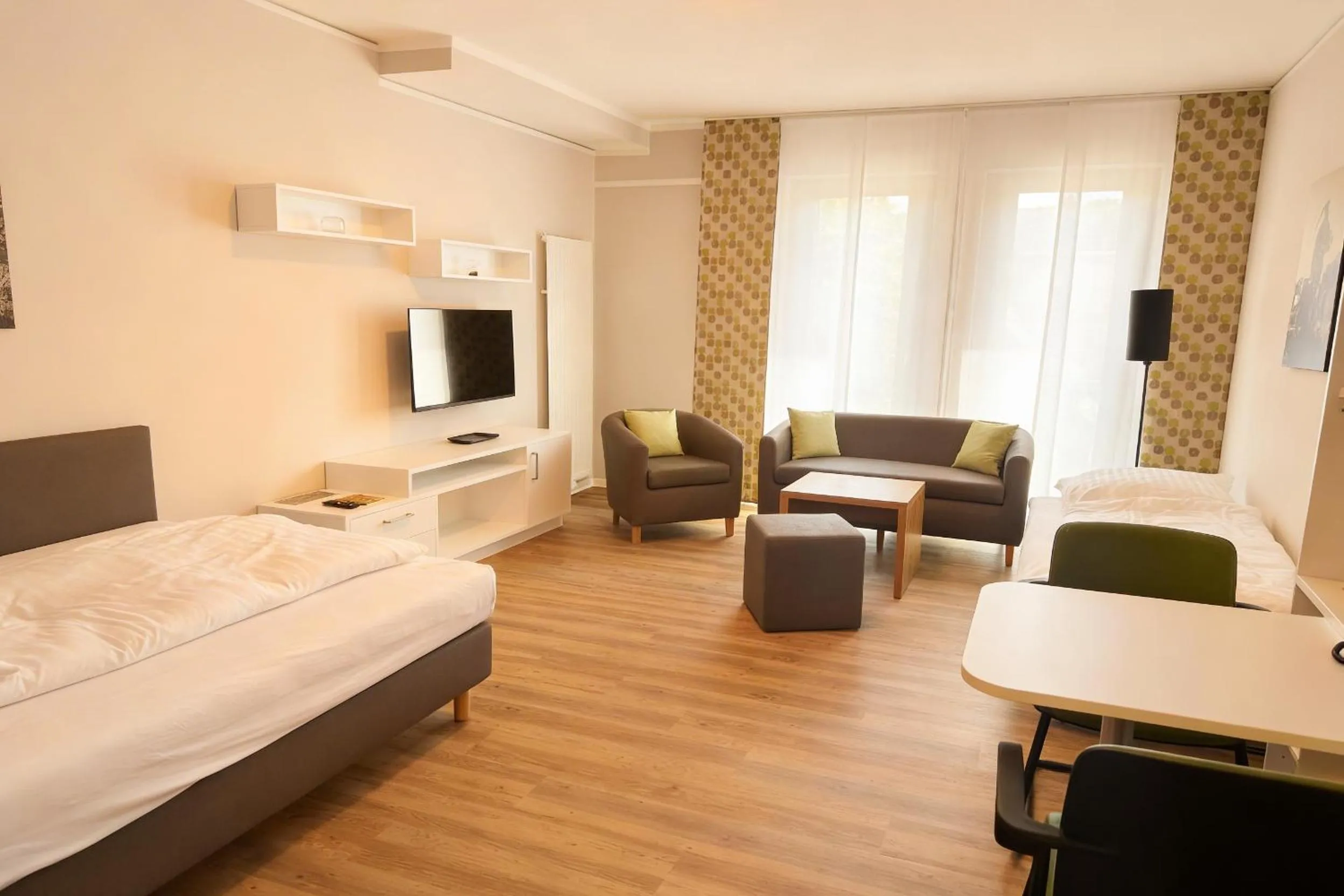 Bed in ADAPT APARTMENT HOTEL Siegen
