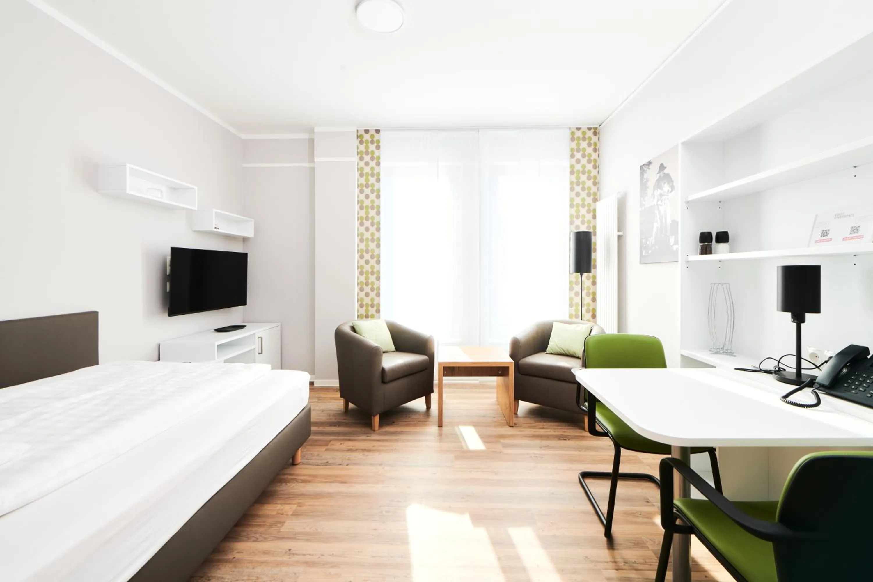 Bed in ADAPT APARTMENT HOTEL Siegen