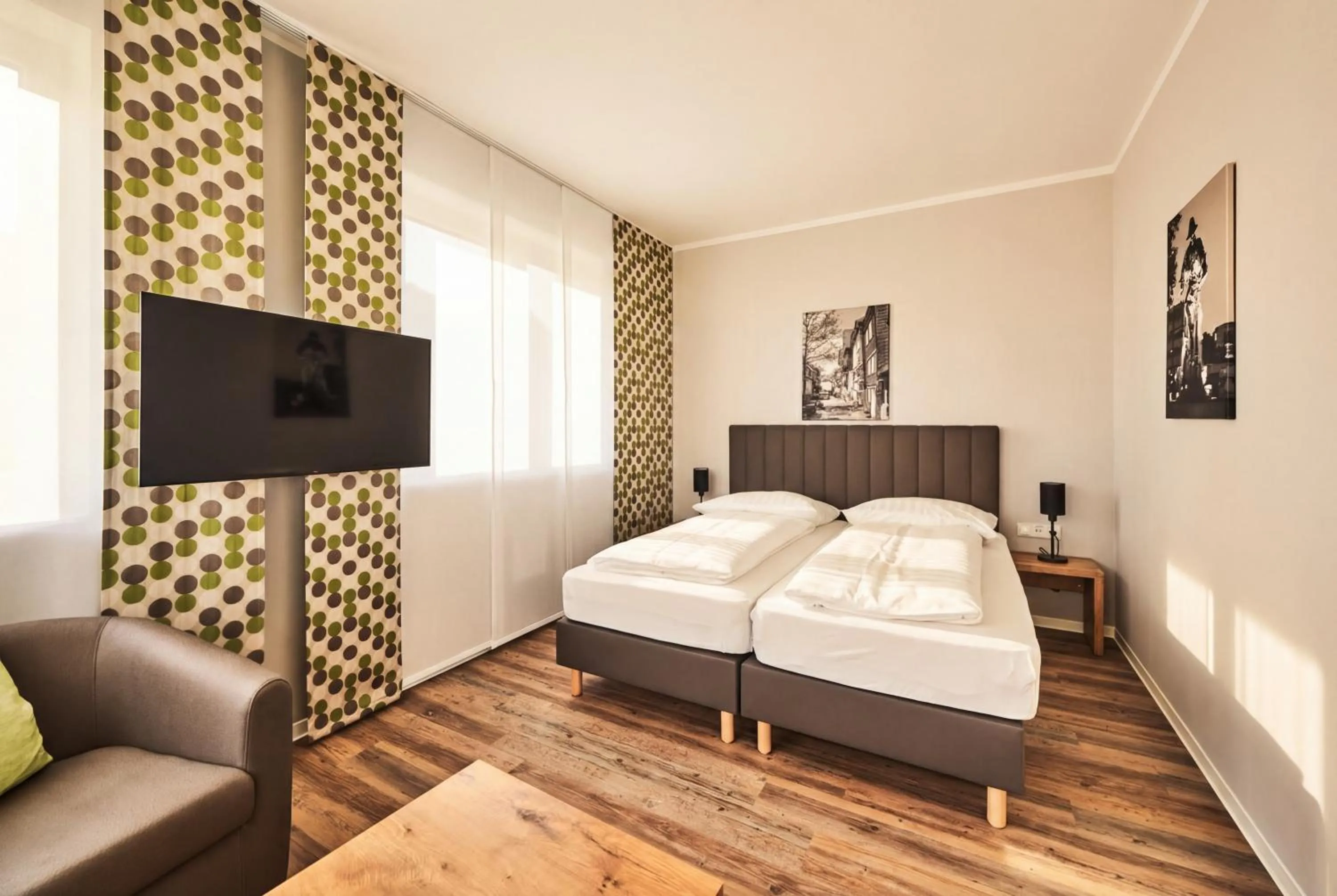 Bed in ADAPT APARTMENT HOTEL Siegen