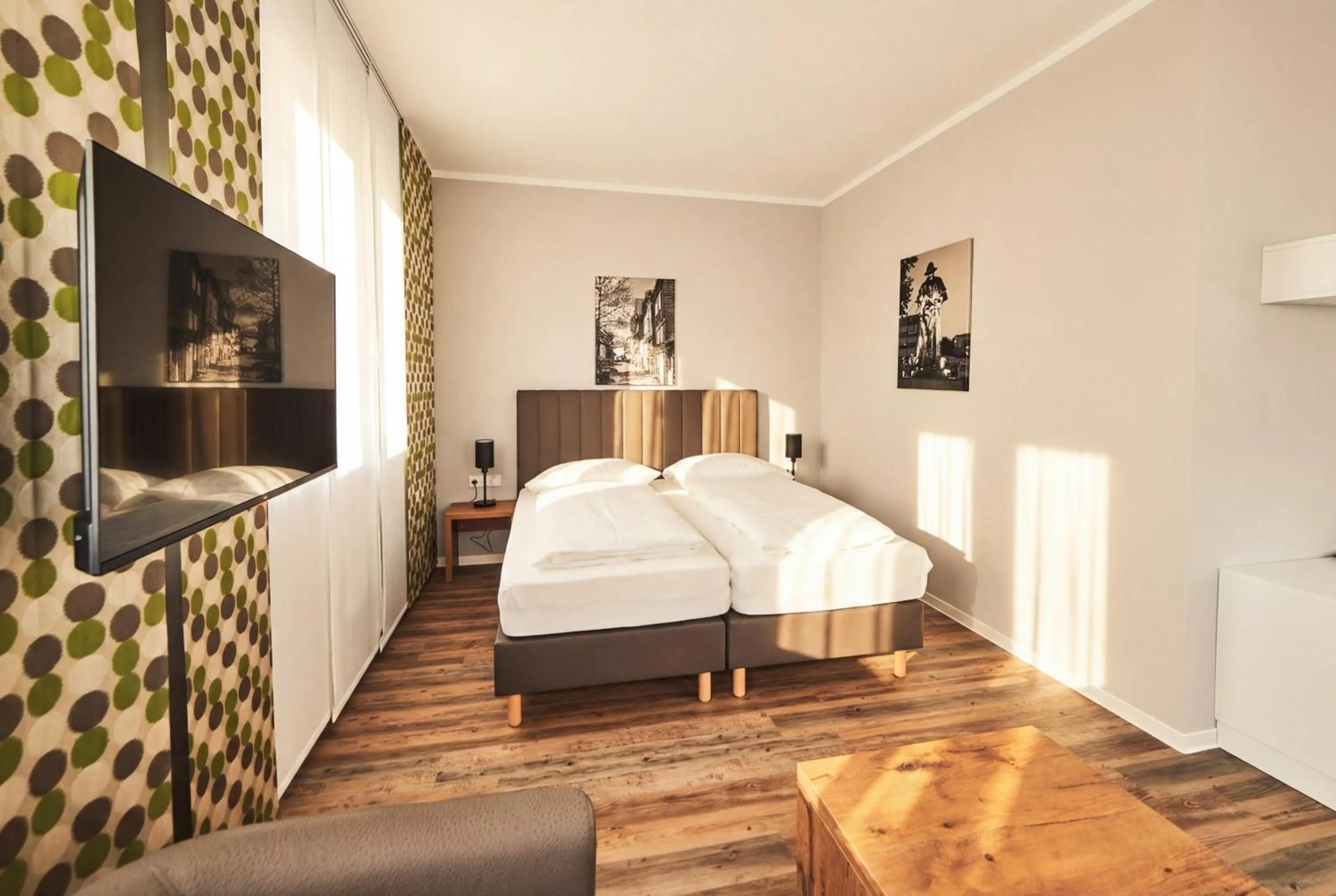 Bed in ADAPT APARTMENT HOTEL Siegen