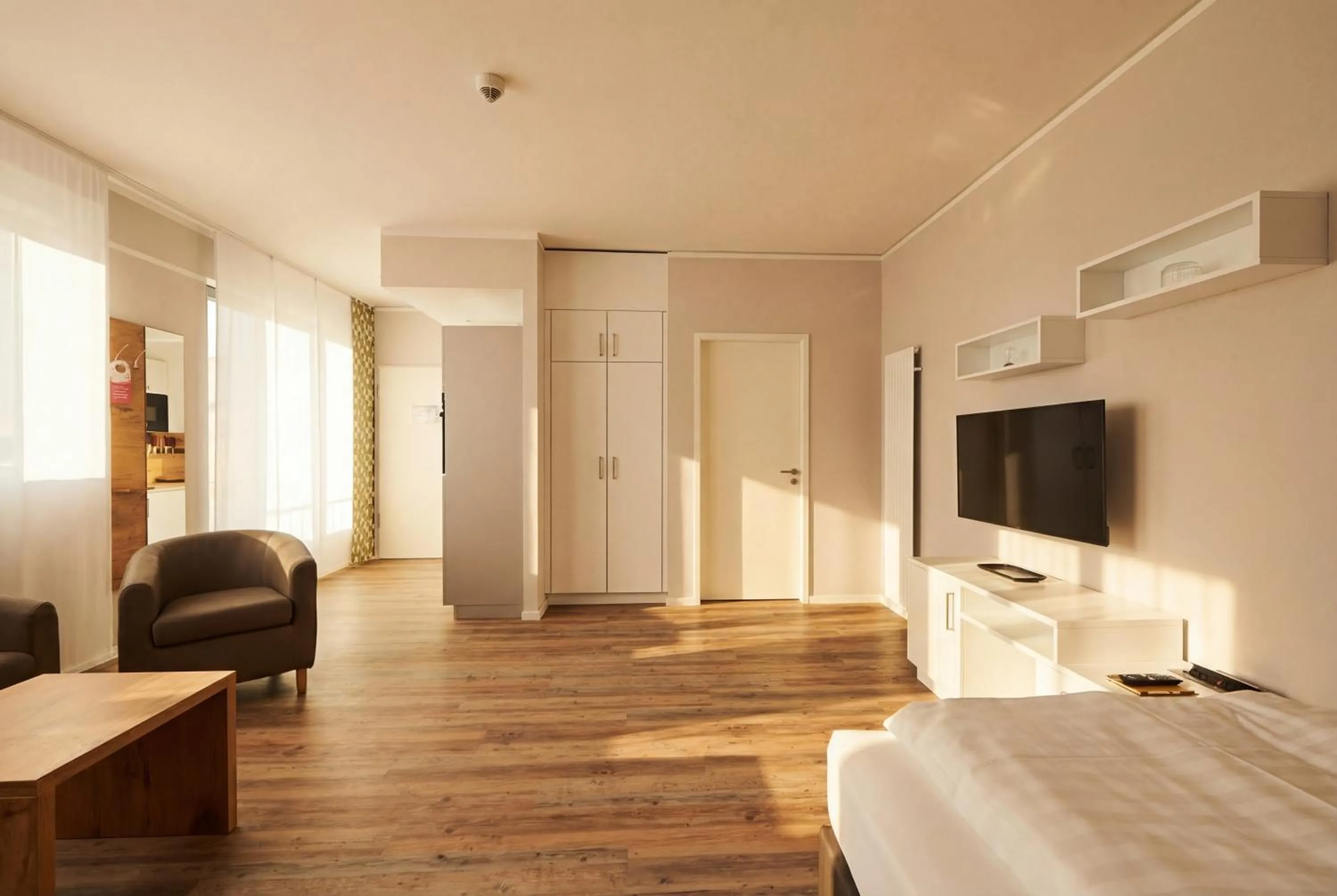 Bed in ADAPT APARTMENT HOTEL Siegen