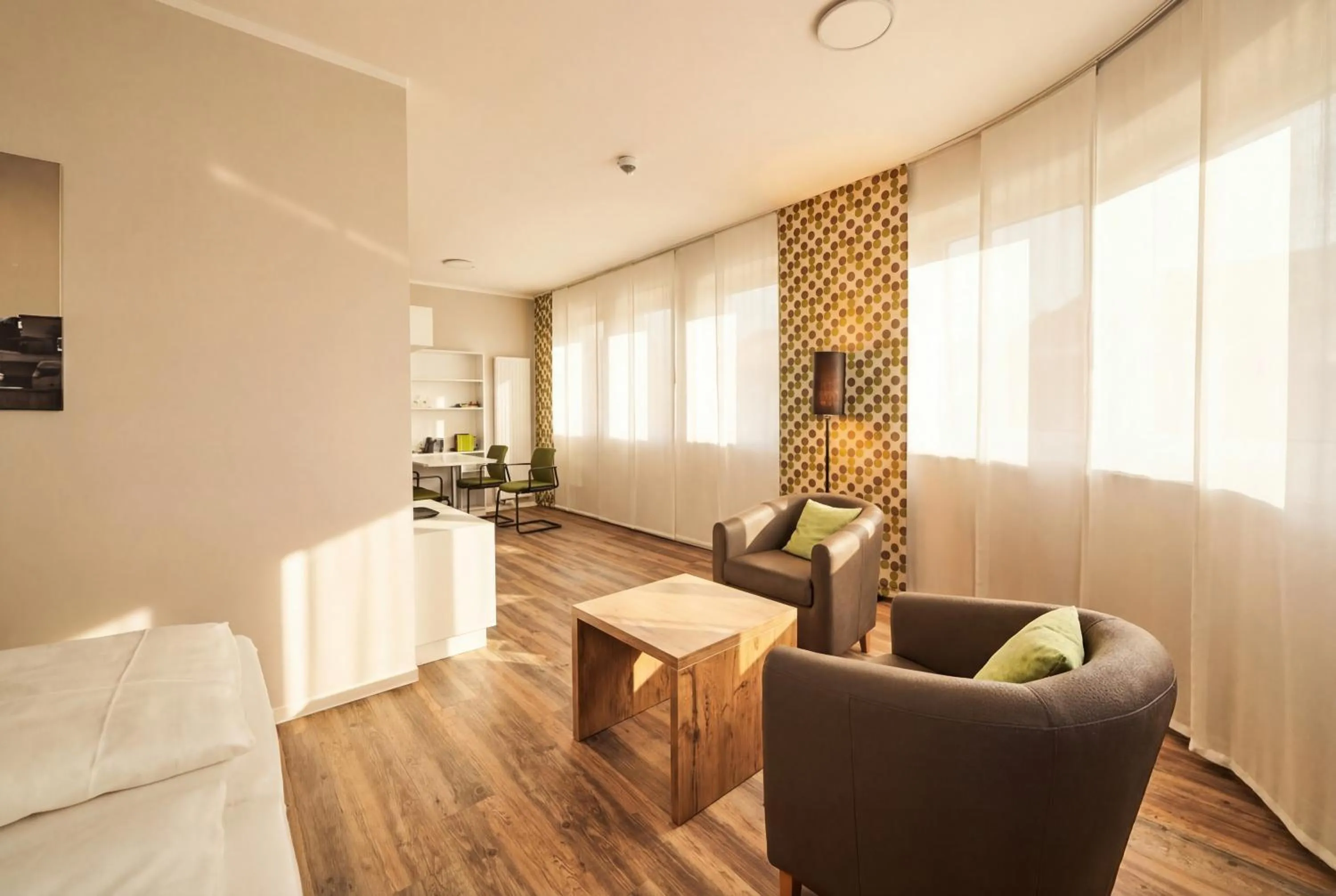 Seating area, Bed in ADAPT APARTMENT HOTEL Siegen
