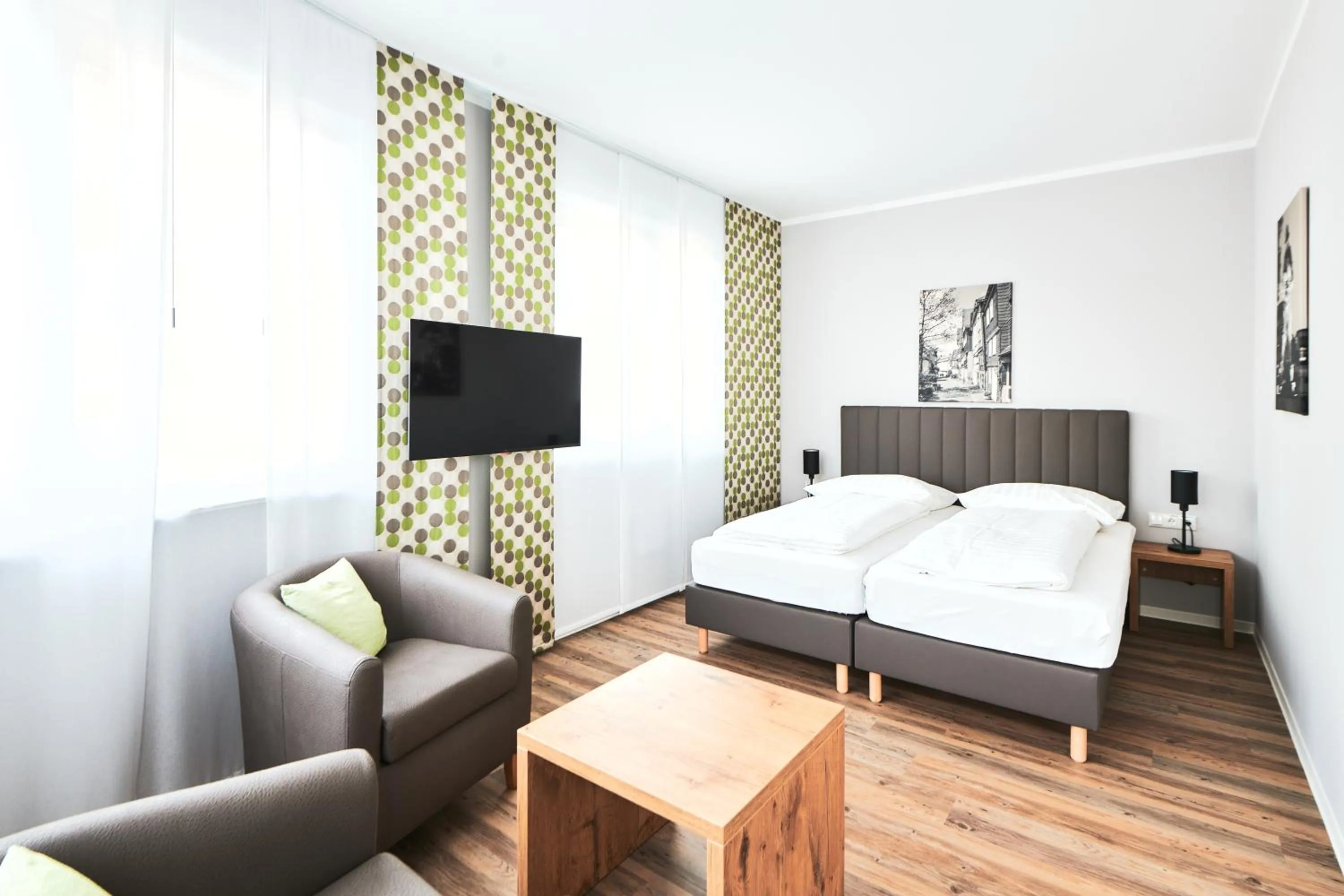 Bed in ADAPT APARTMENT HOTEL Siegen