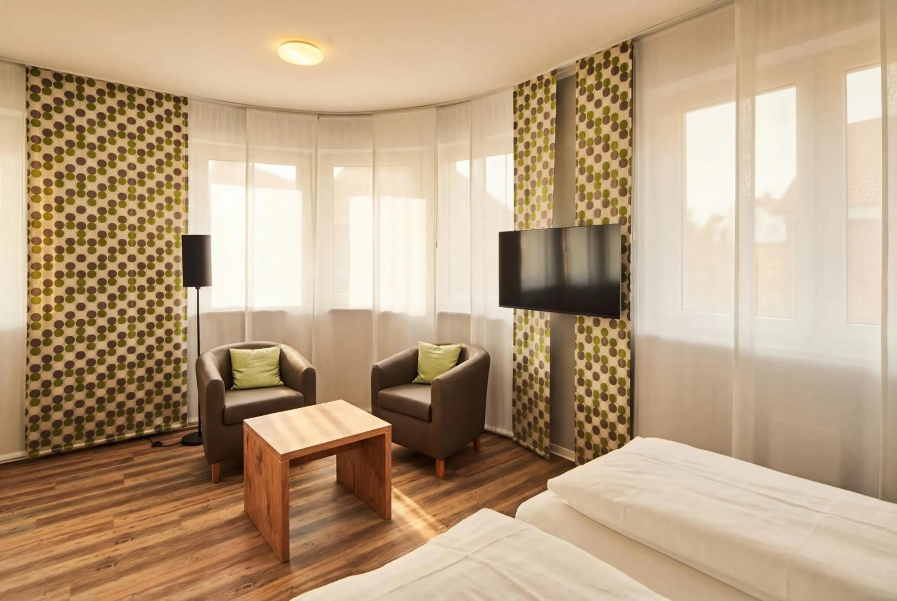 TV and multimedia, Bed in ADAPT APARTMENT HOTEL Siegen