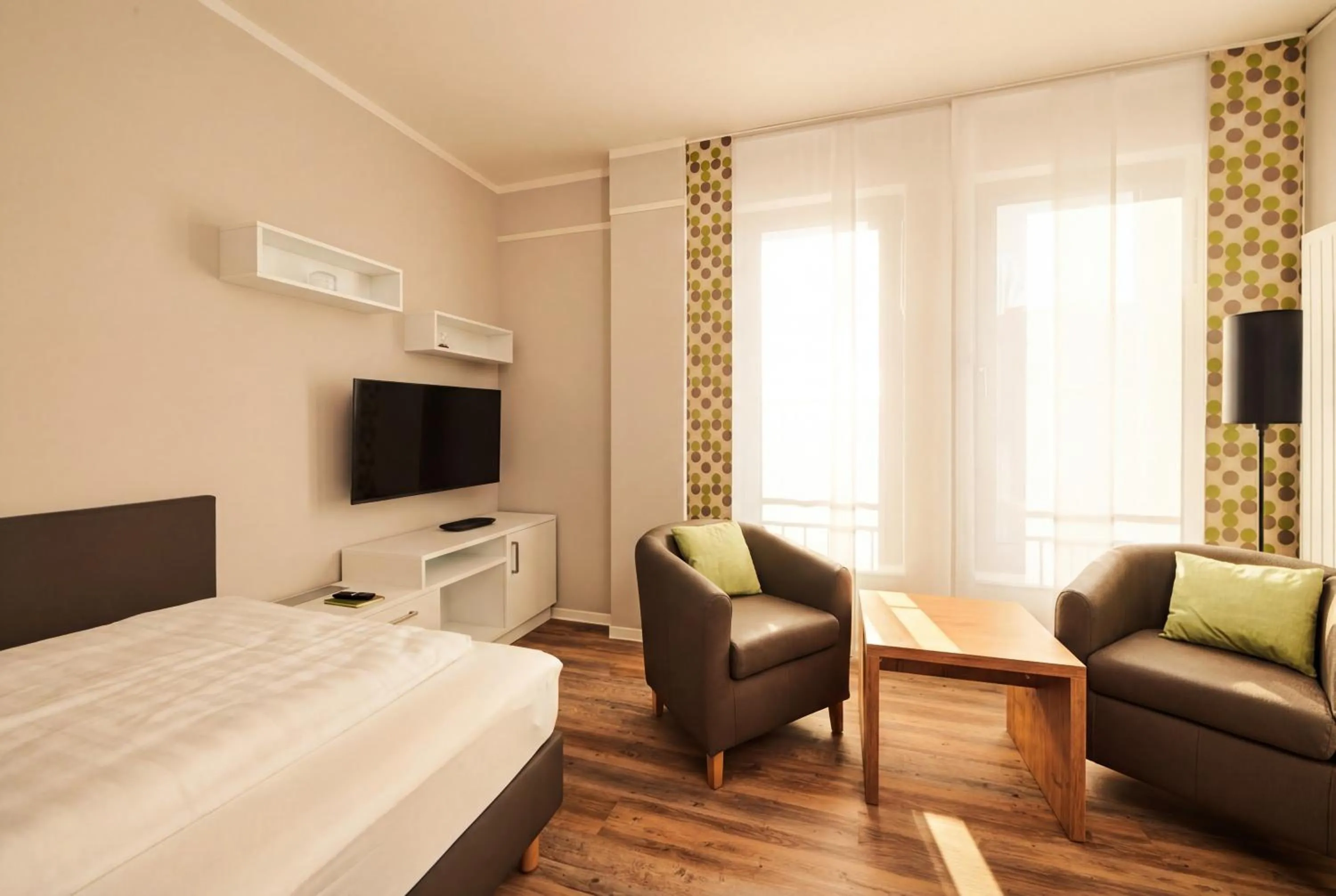 TV and multimedia, Bed in ADAPT APARTMENT HOTEL Siegen