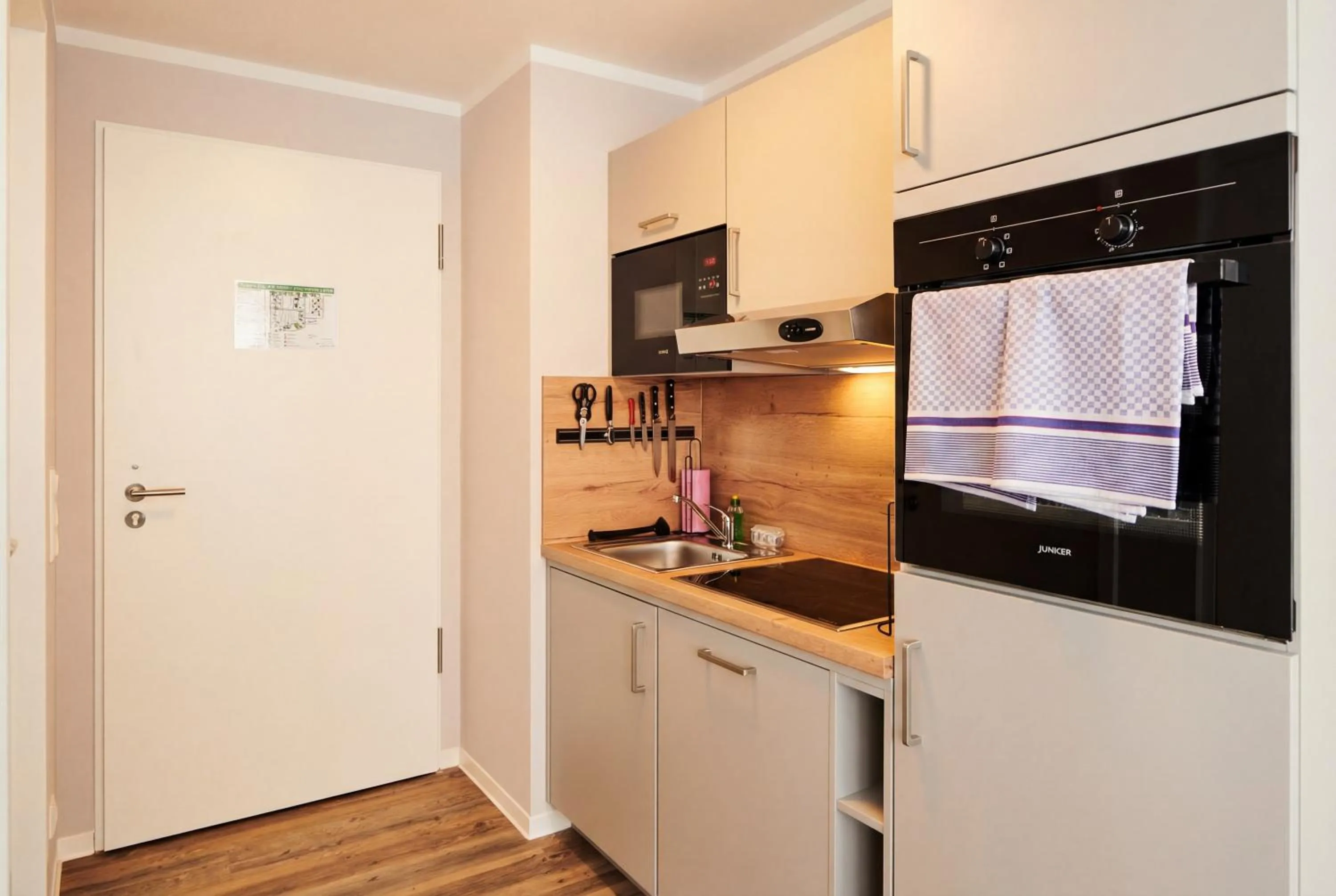Kitchen or kitchenette in ADAPT APARTMENT HOTEL Siegen
