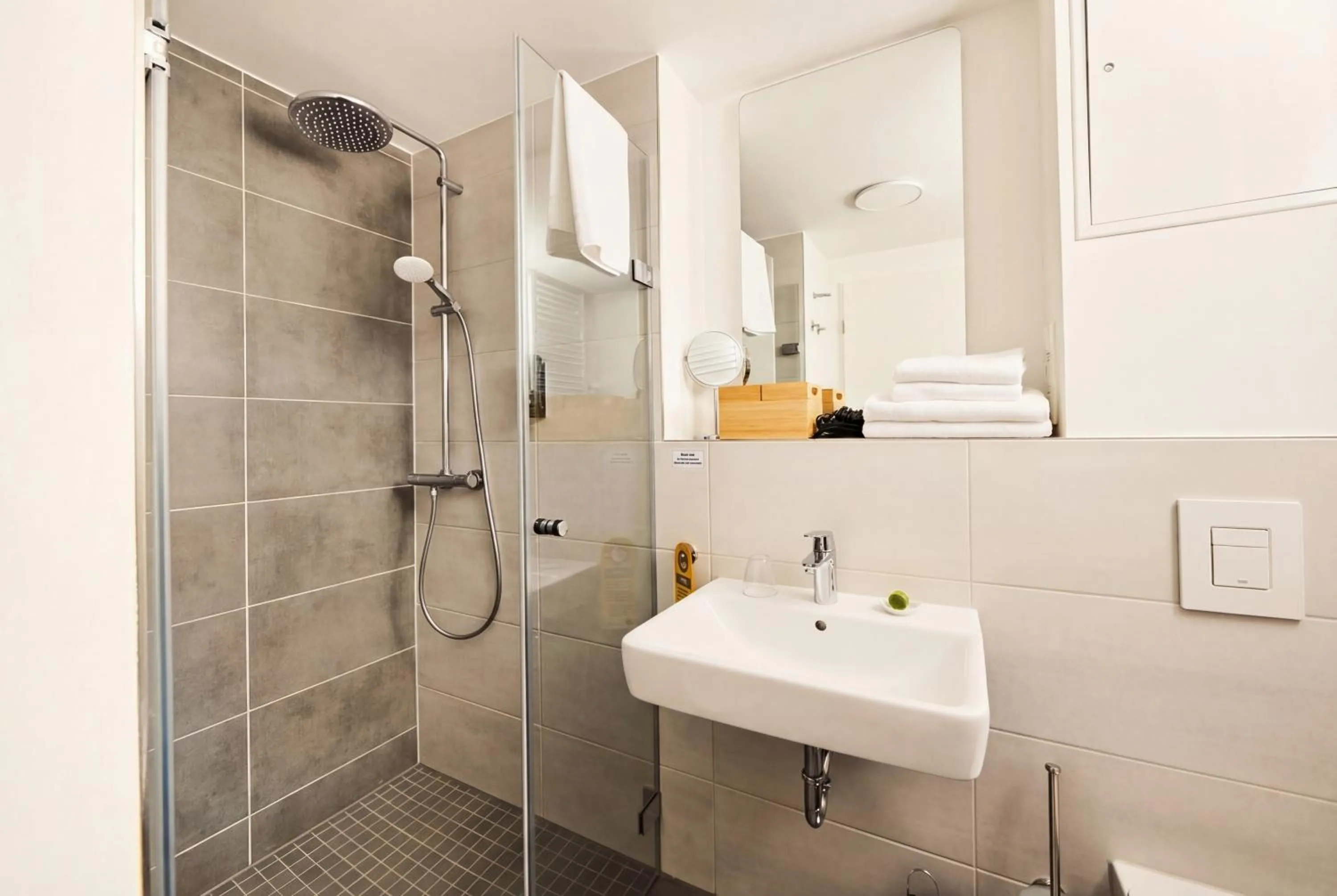 Shower in ADAPT APARTMENT HOTEL Siegen