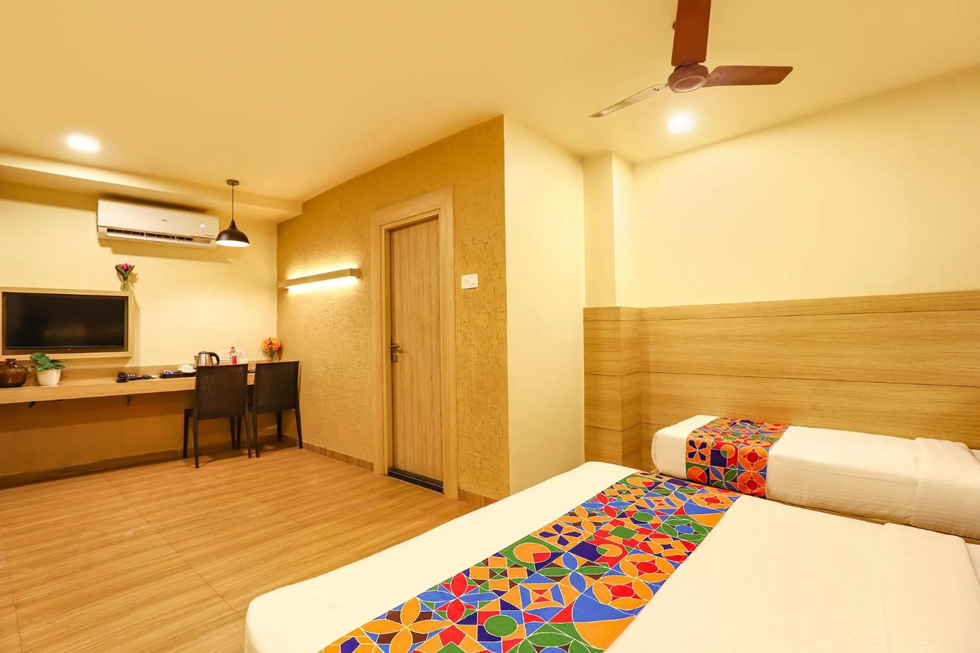 Bed in FabHotel Nestlay Rooms High Court