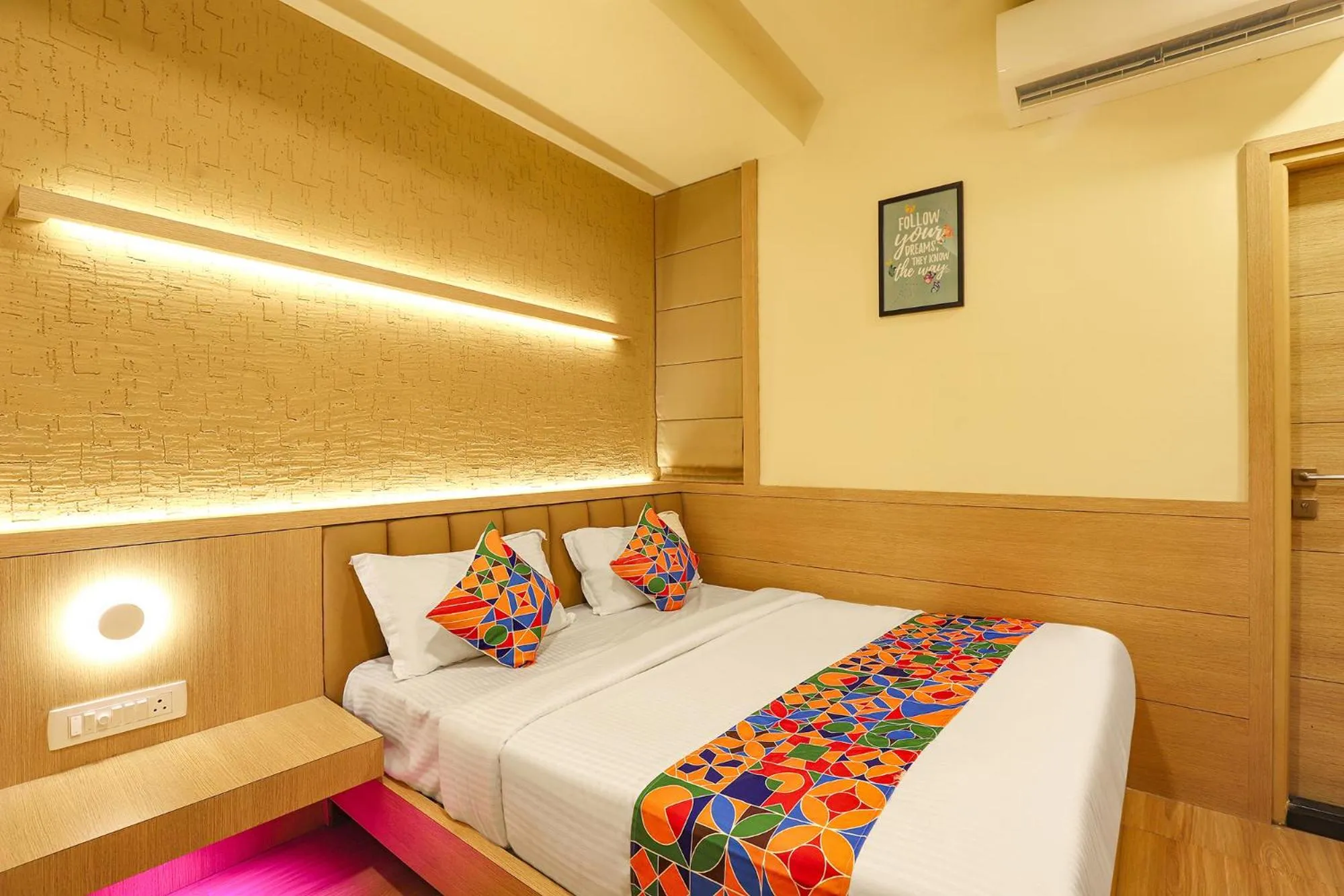 Bed in FabHotel Nestlay Rooms High Court