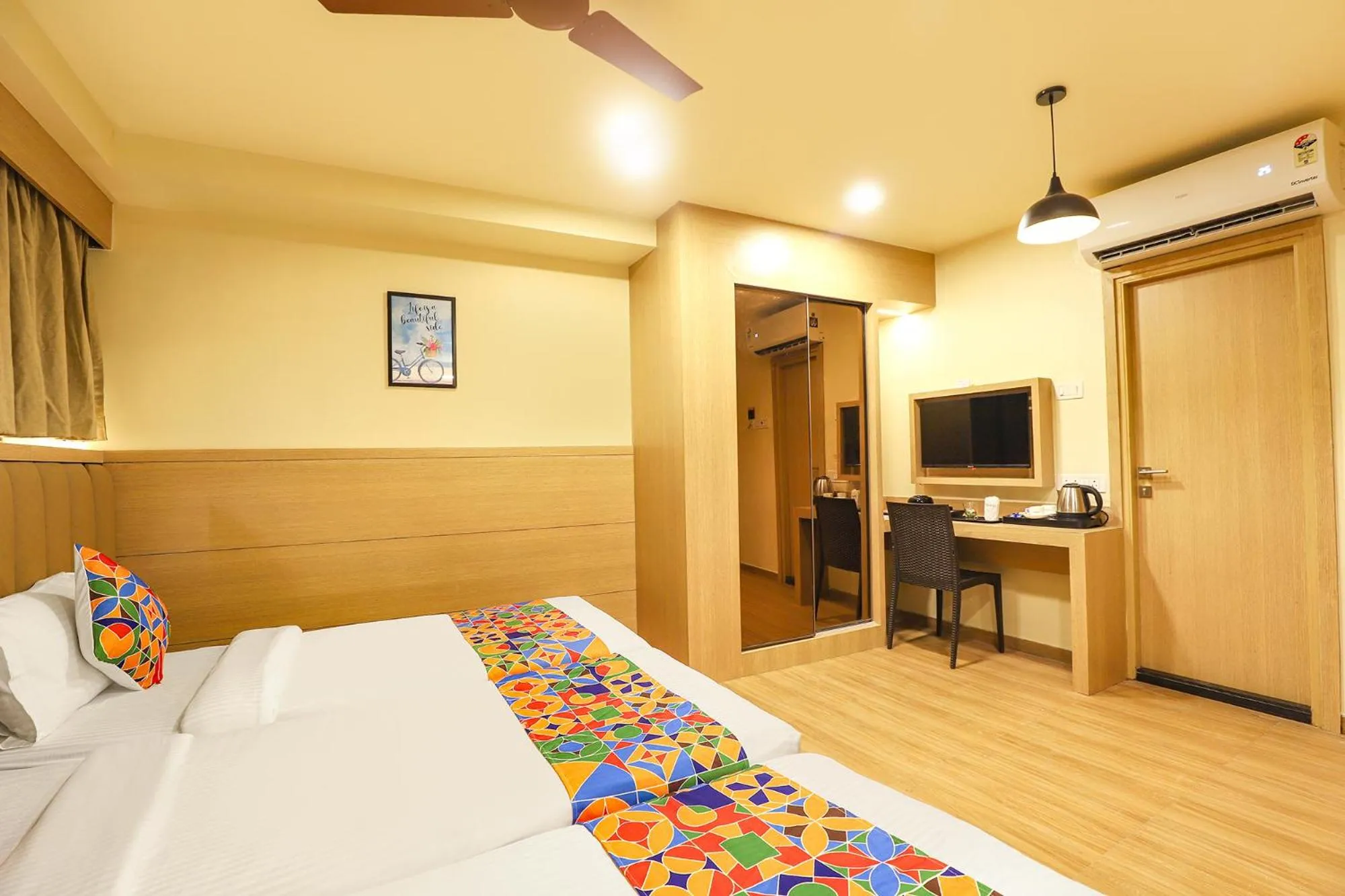 Bed in FabHotel Nestlay Rooms High Court