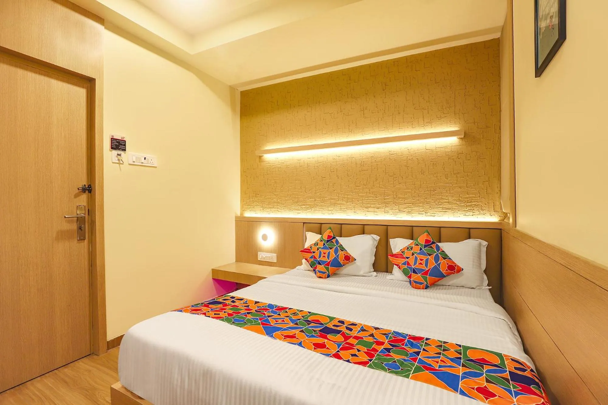 Bed in FabHotel Nestlay Rooms High Court