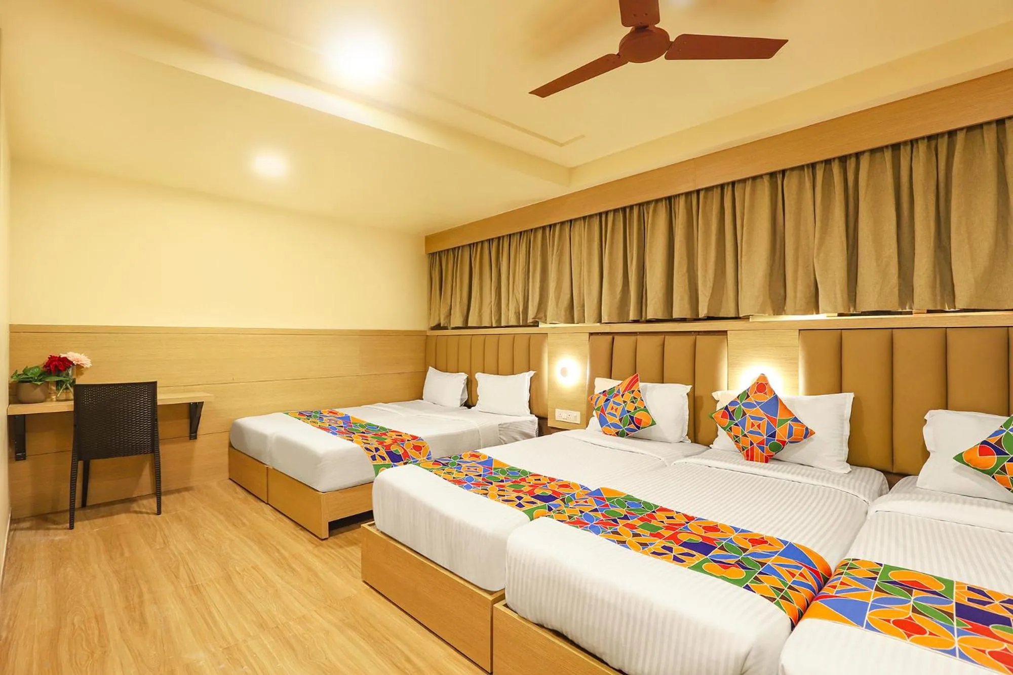 Bed in FabHotel Nestlay Rooms High Court