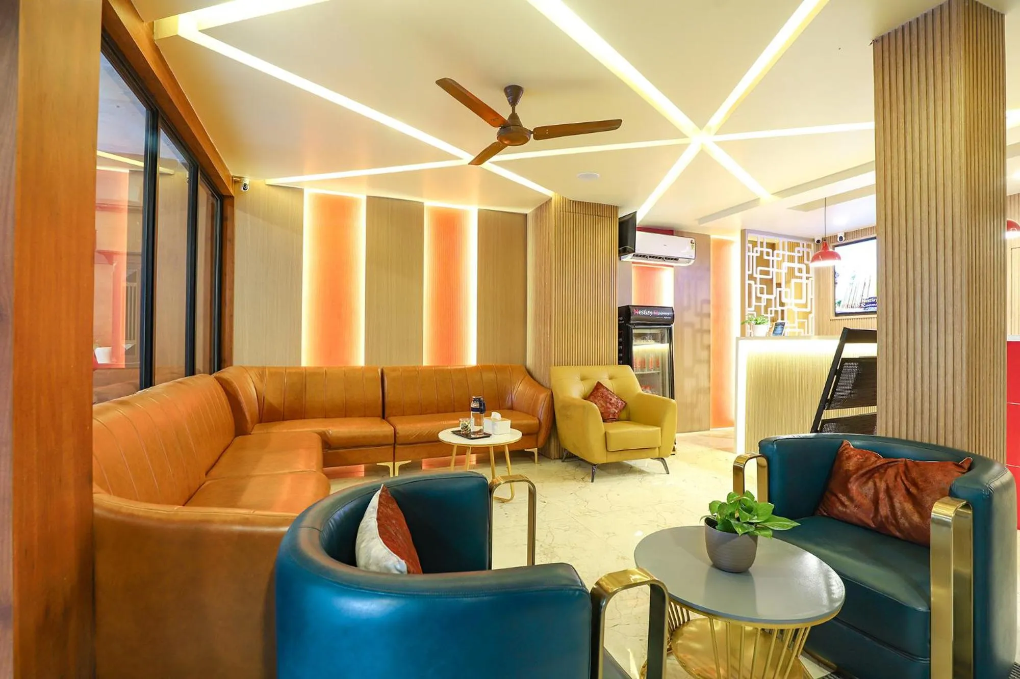 Living room in FabHotel Nestlay Rooms High Court