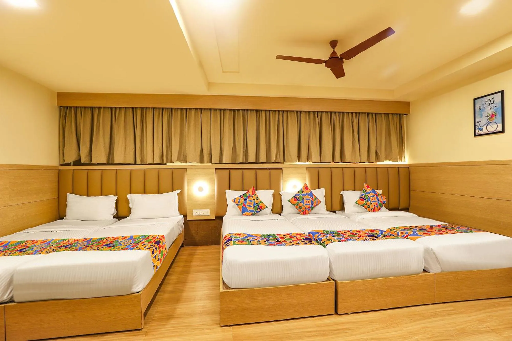 Bed in FabHotel Nestlay Rooms High Court