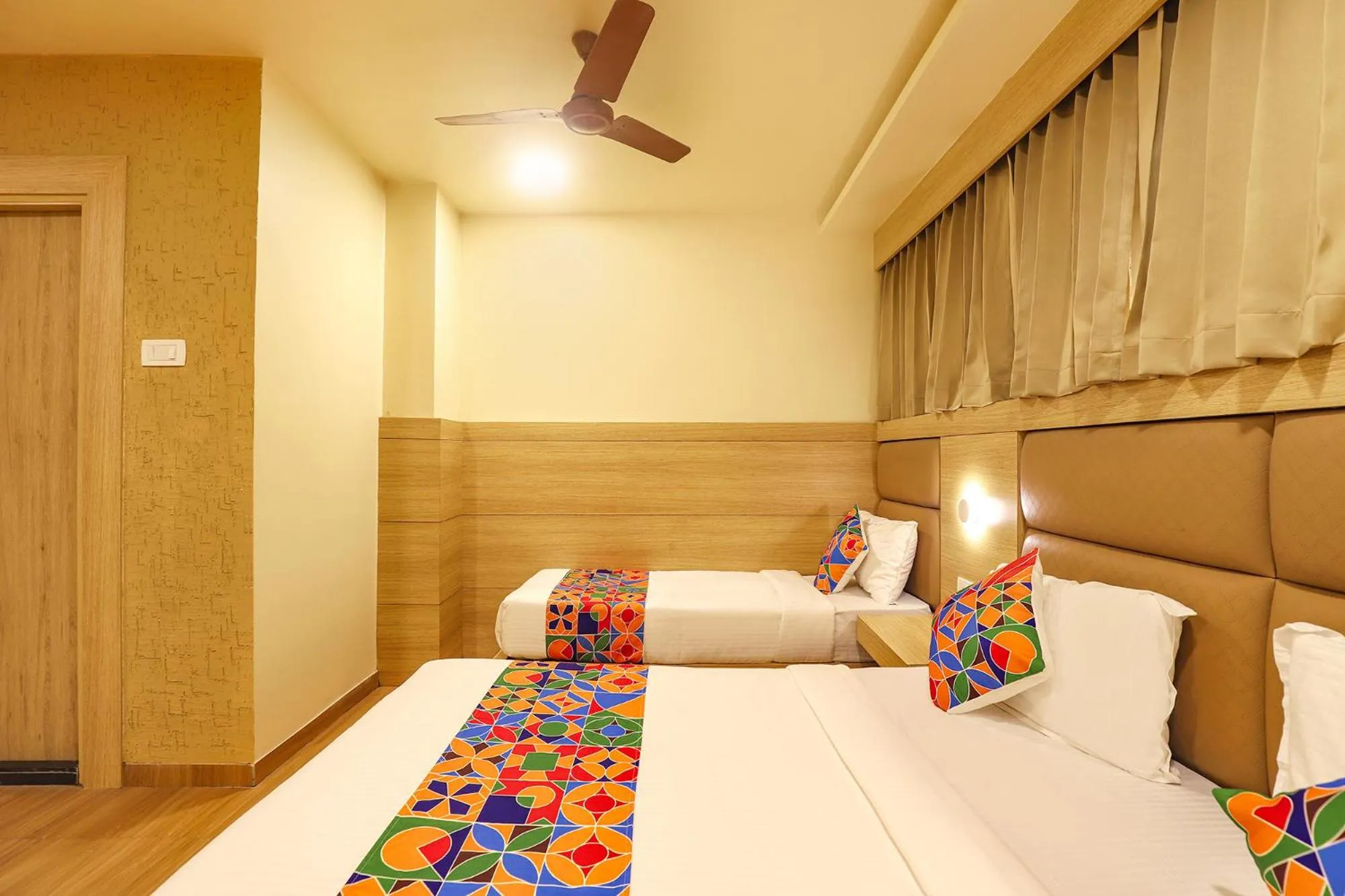 Bed in FabHotel Nestlay Rooms High Court