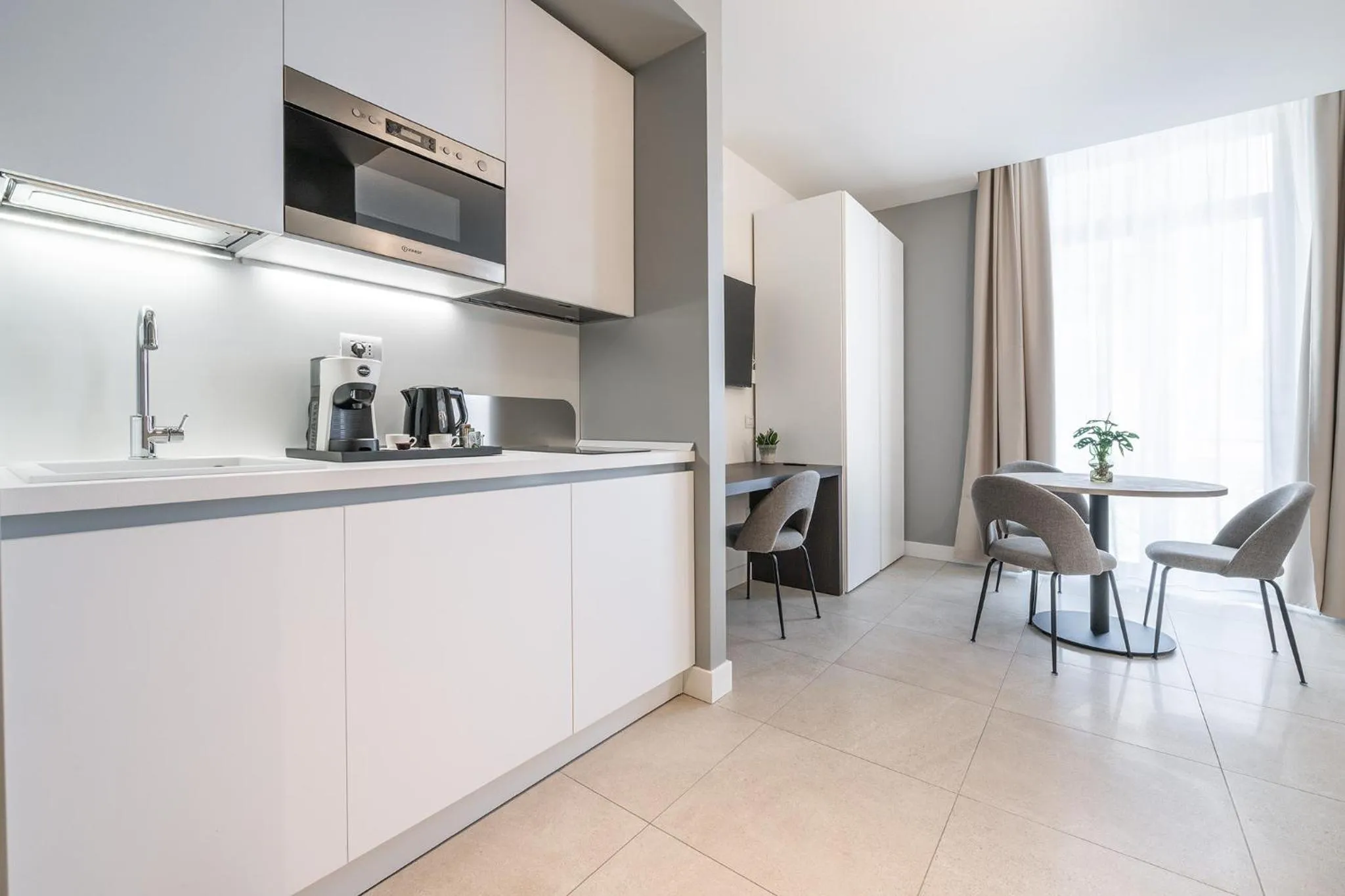 Kitchen or kitchenette in Karalin Sonnino Suites