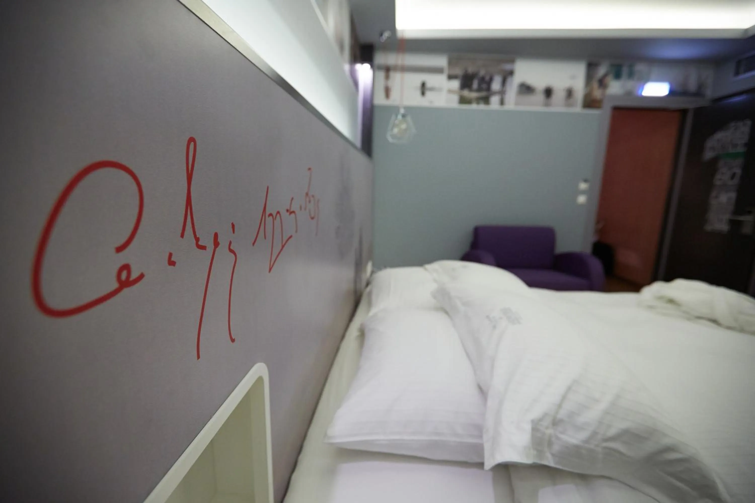 Decorative detail, Bed in Veritas Boutique Art Hotel