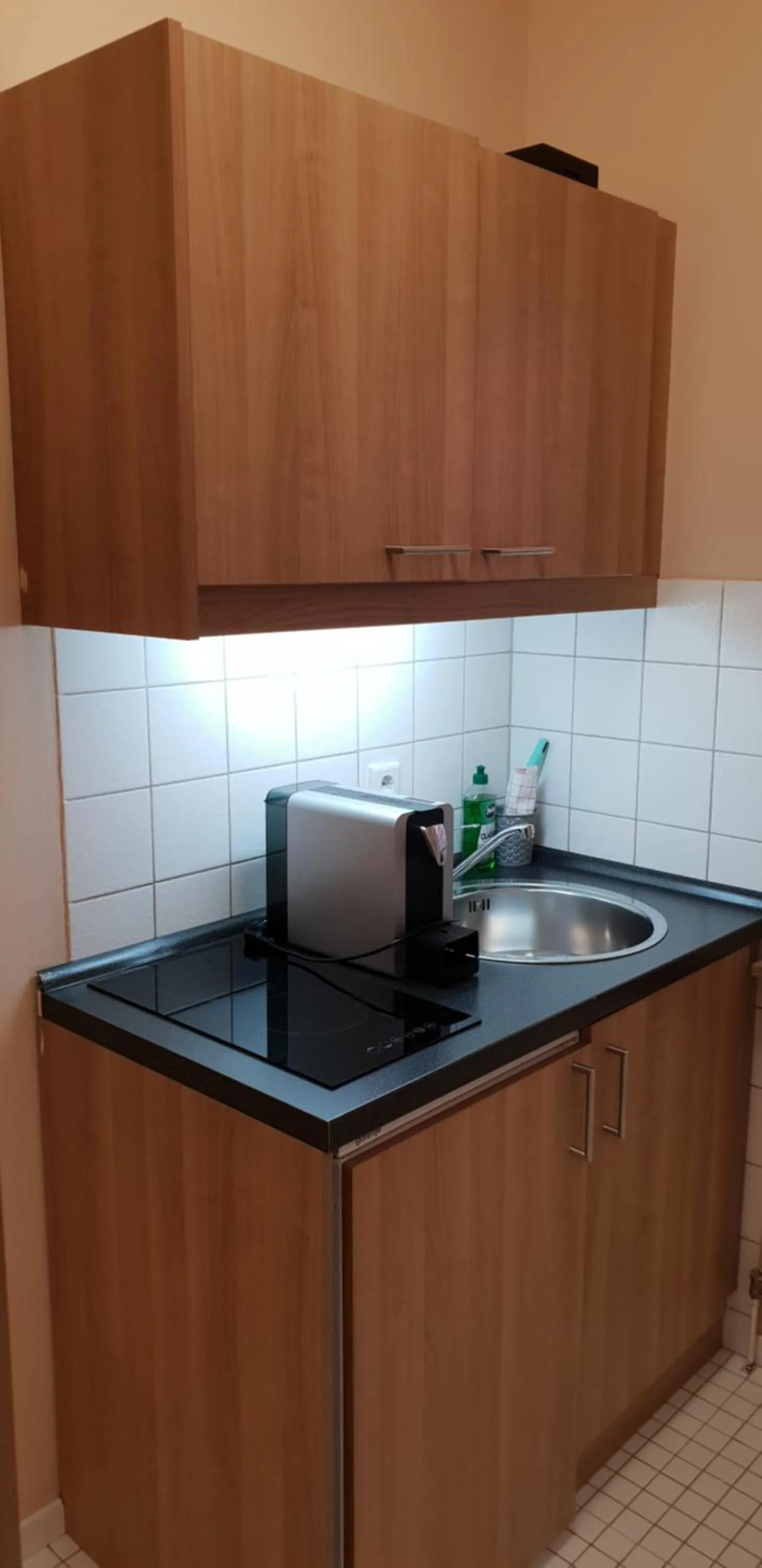 Kitchen or kitchenette in Airport Hotel One Aparthotel Sylt