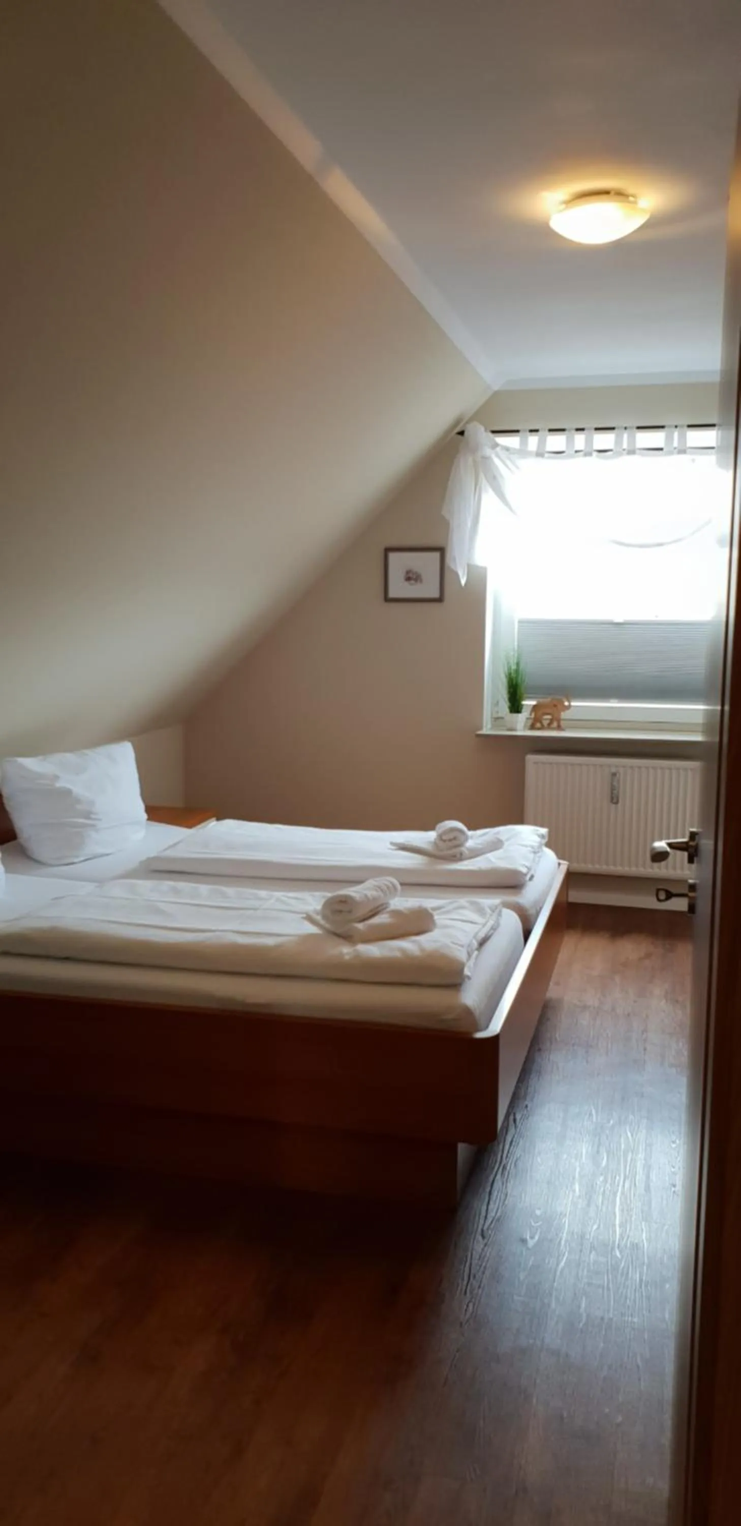 Bed in Airport Hotel One Aparthotel Sylt