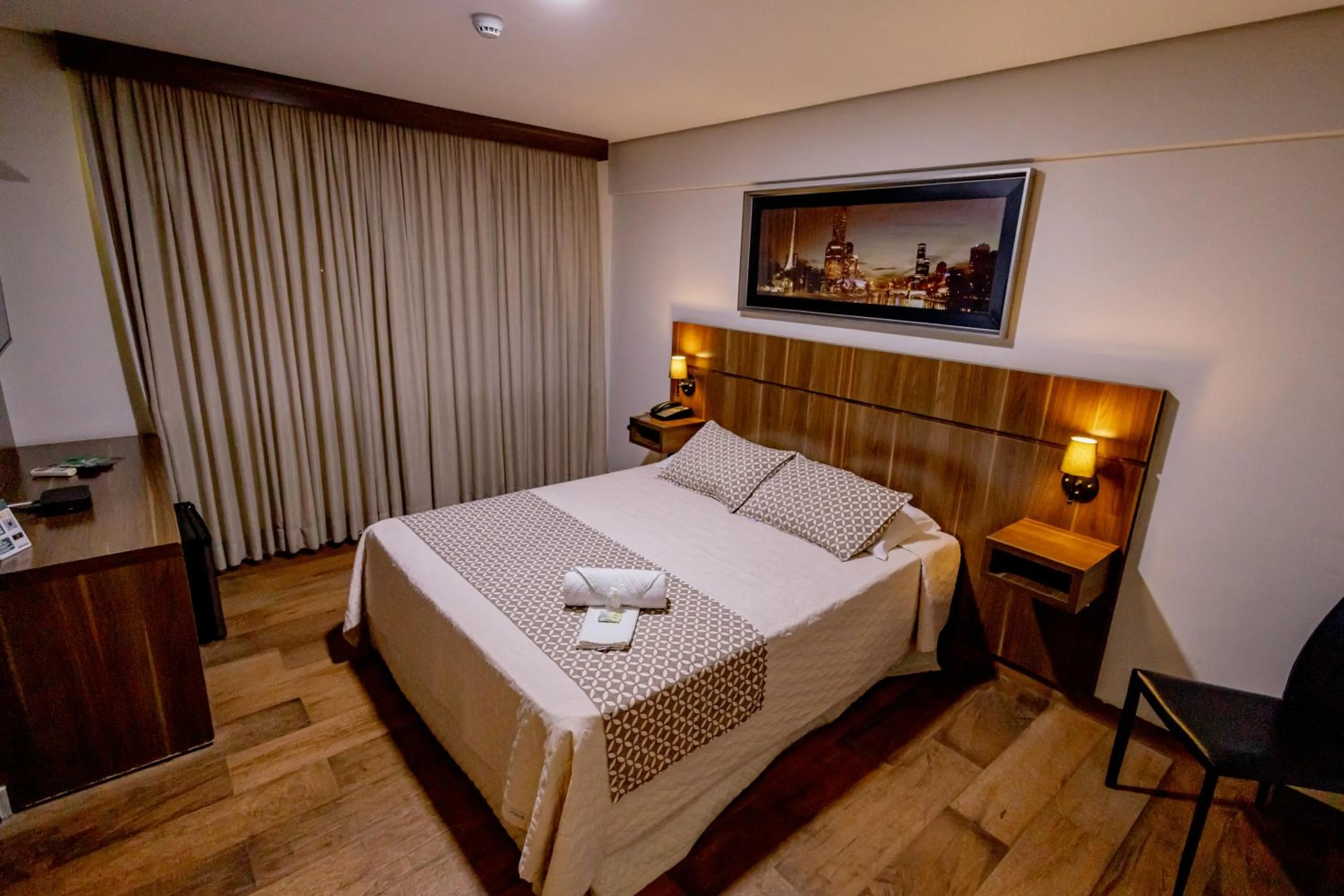 Bed in Padom Business Hotel