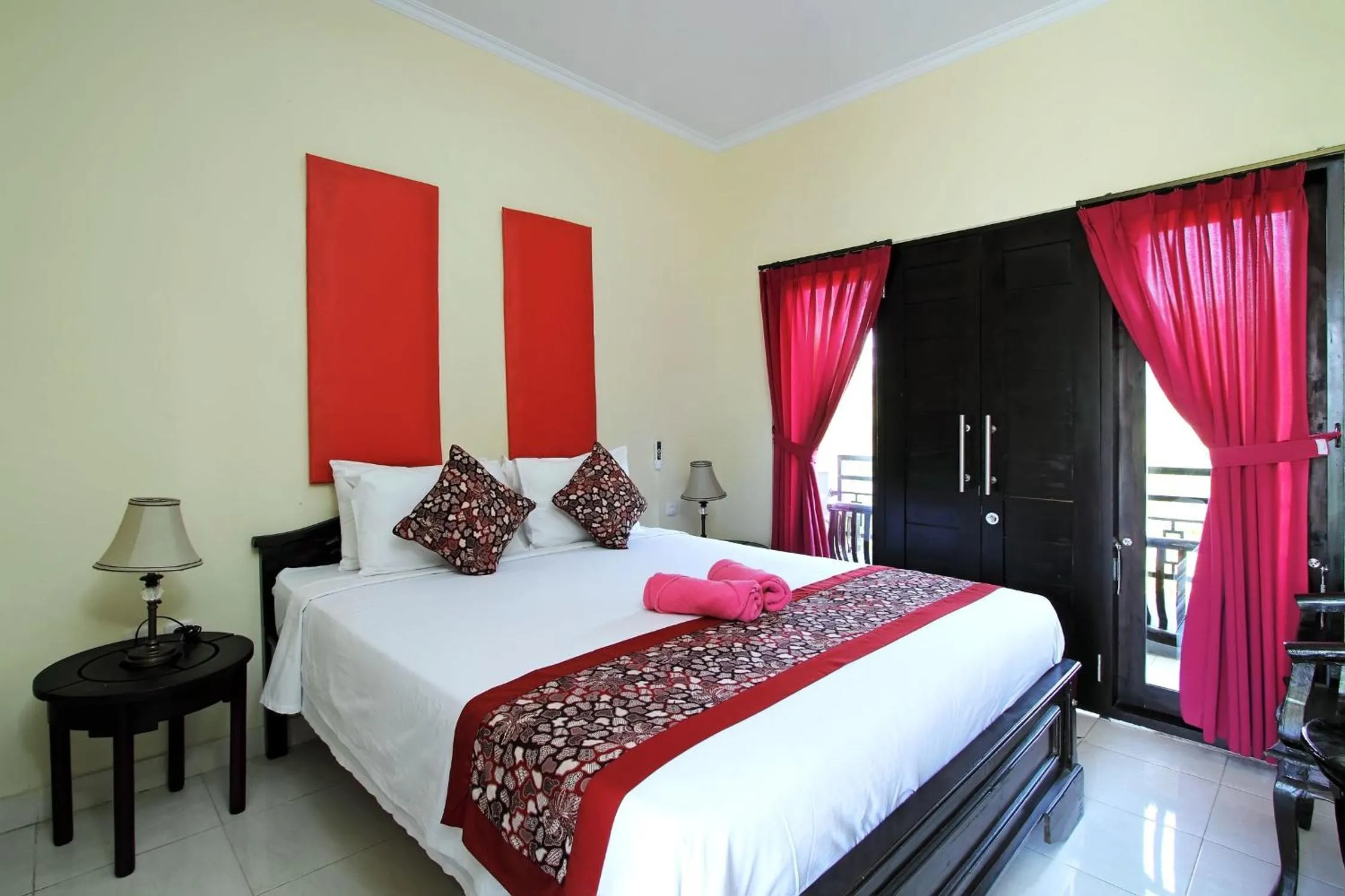 Bed in Ramantika Bali House