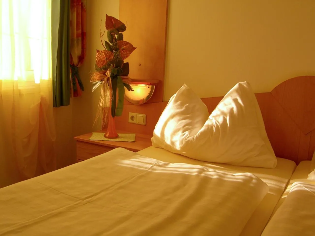 Bed in LiebesNesterl Bergwirt - Boutique Hotel