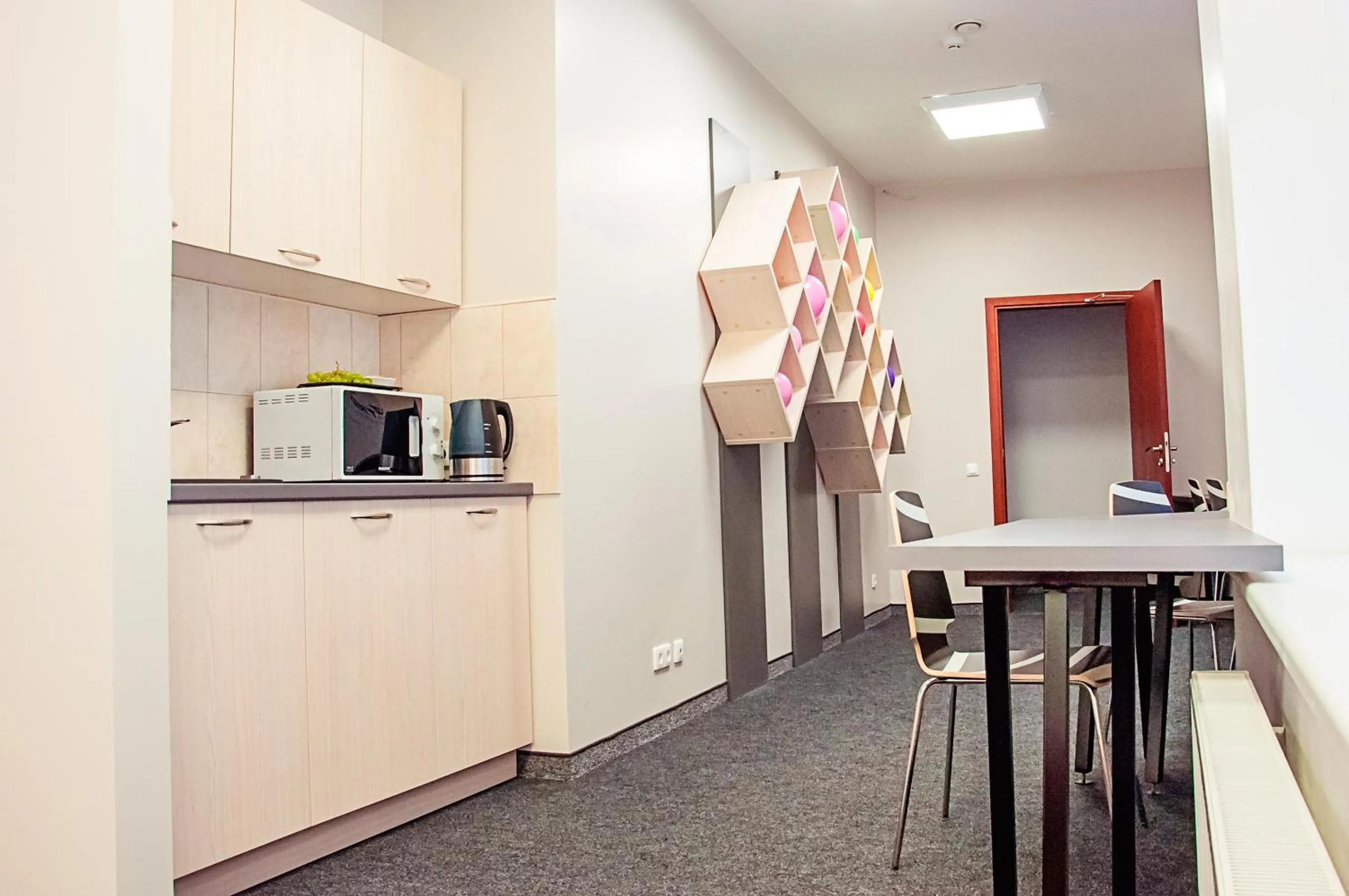 Communal lounge/ TV room in Mosaic Hotel