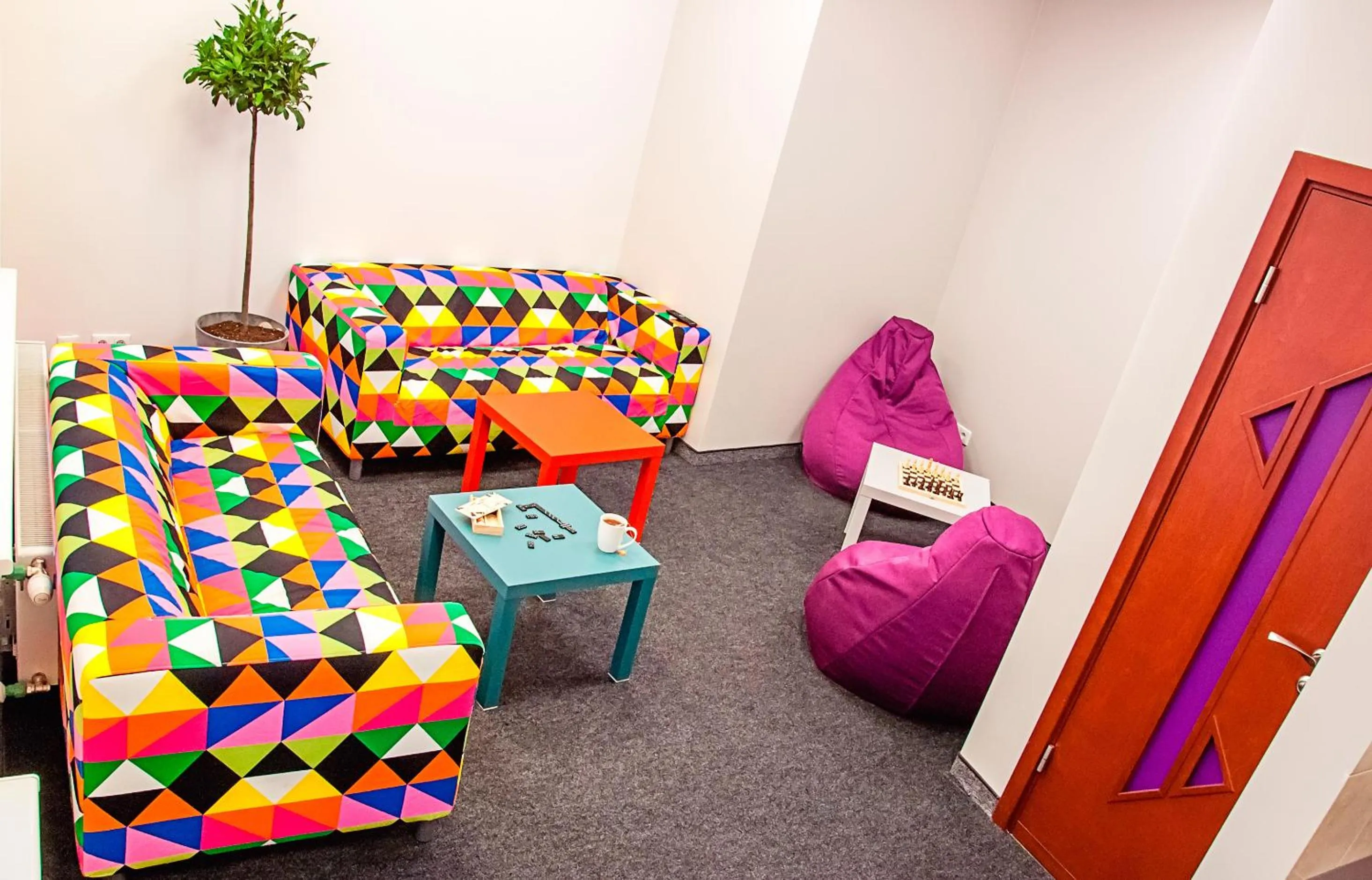 Communal lounge/ TV room in Mosaic Hotel