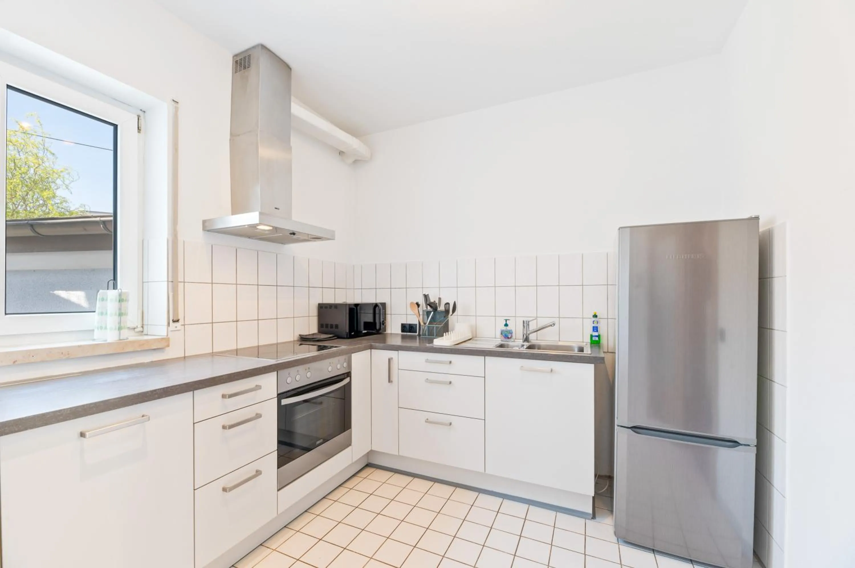 Kitchen or kitchenette in Gästehaus Andrea