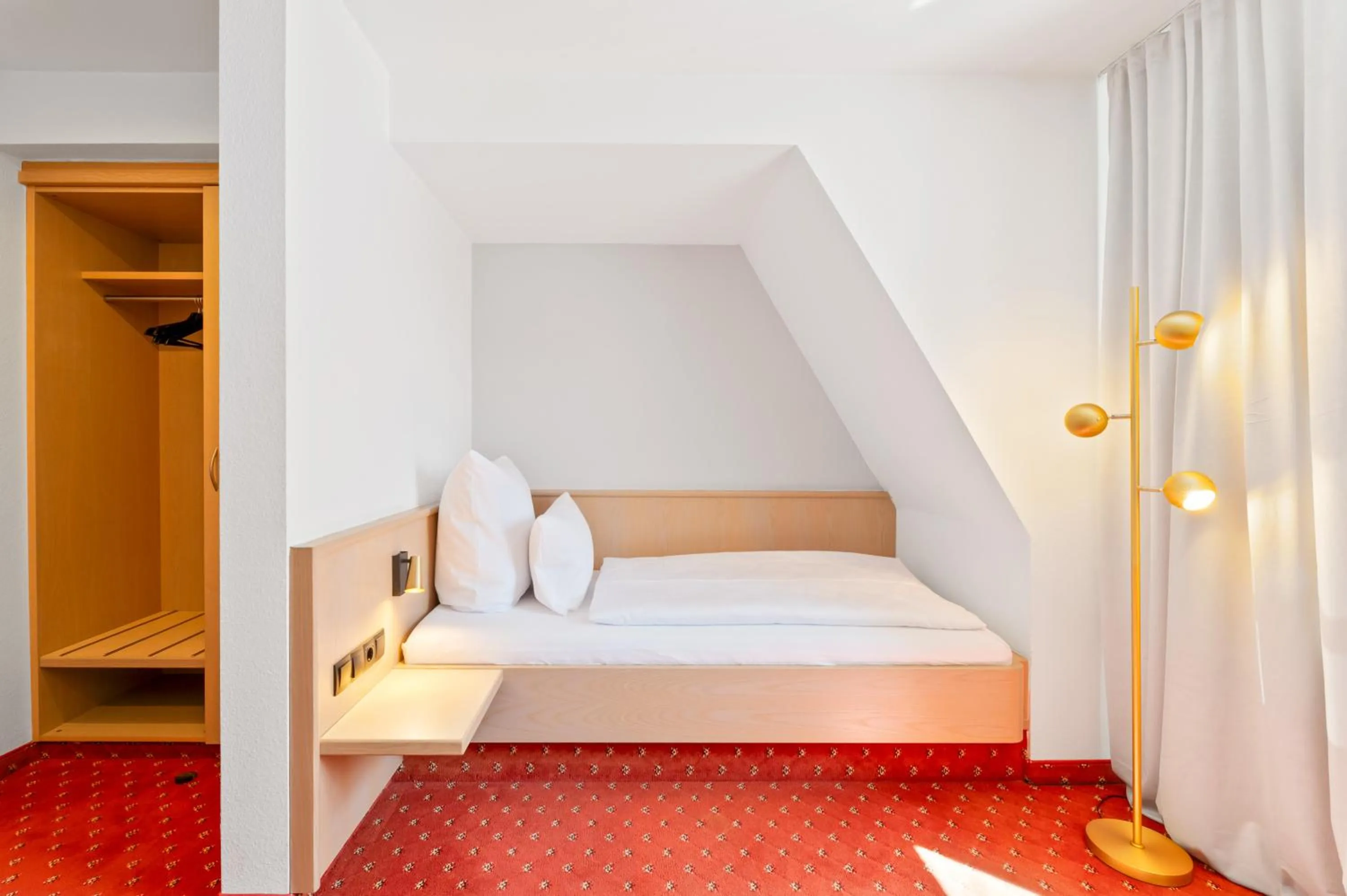 Bed in Gästehaus Andrea