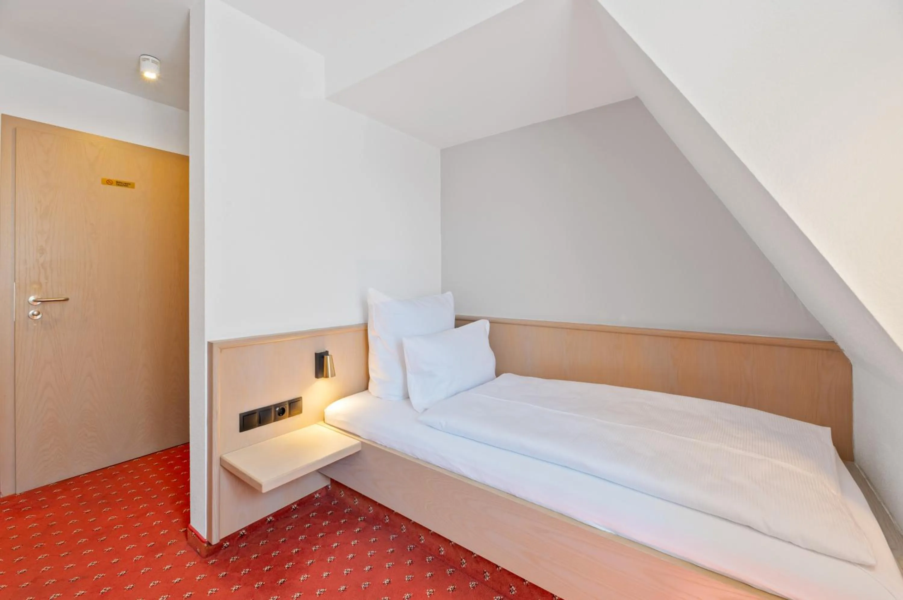 Bed in Gästehaus Andrea