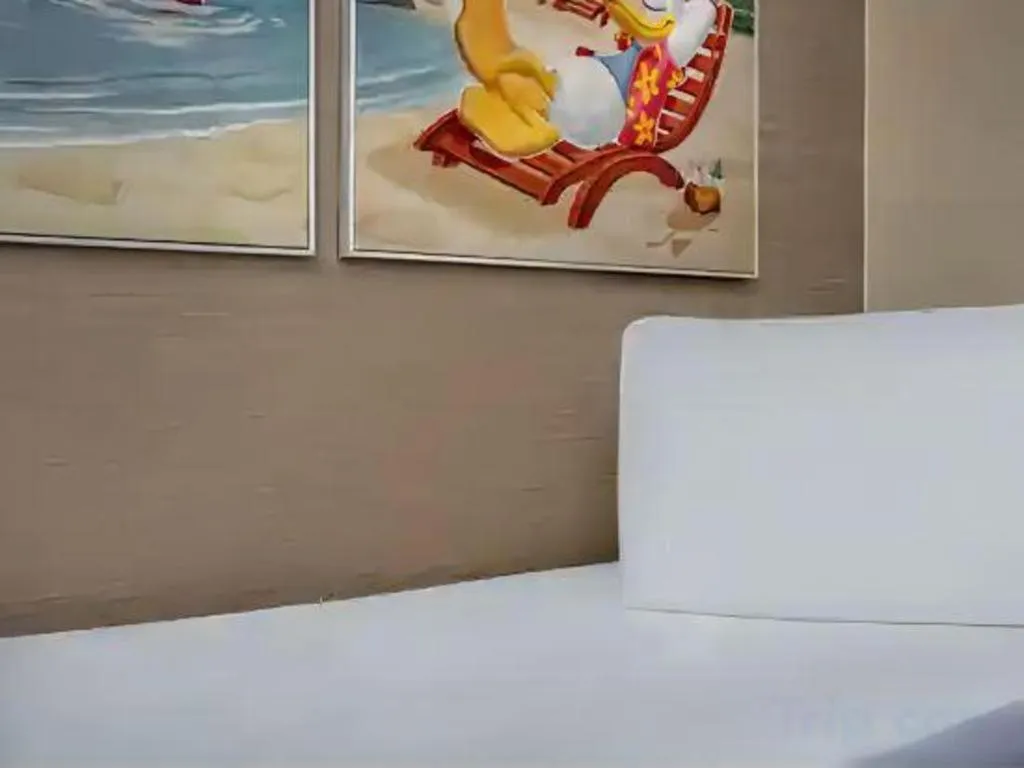 Bed in Disney's Beach Club Resort