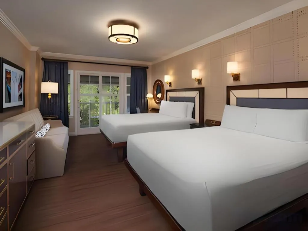 Bed in Disney's Yacht Club Resort