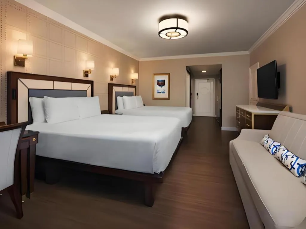 Bed in Disney's Yacht Club Resort