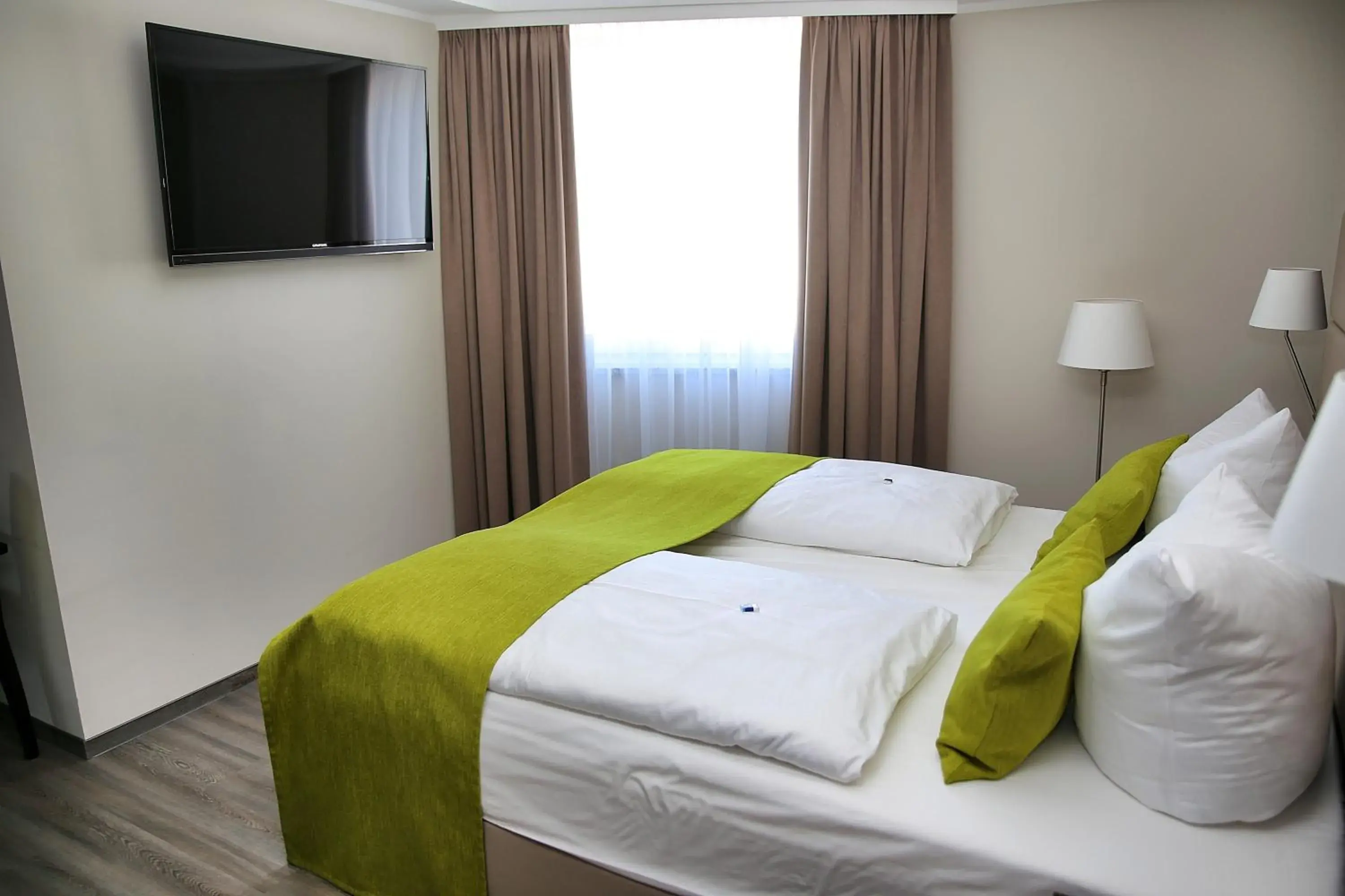 Bedroom, Bed in hotel bomonti Nürnberg West Bedroom, Bed in hotel bomonti Nürnberg West