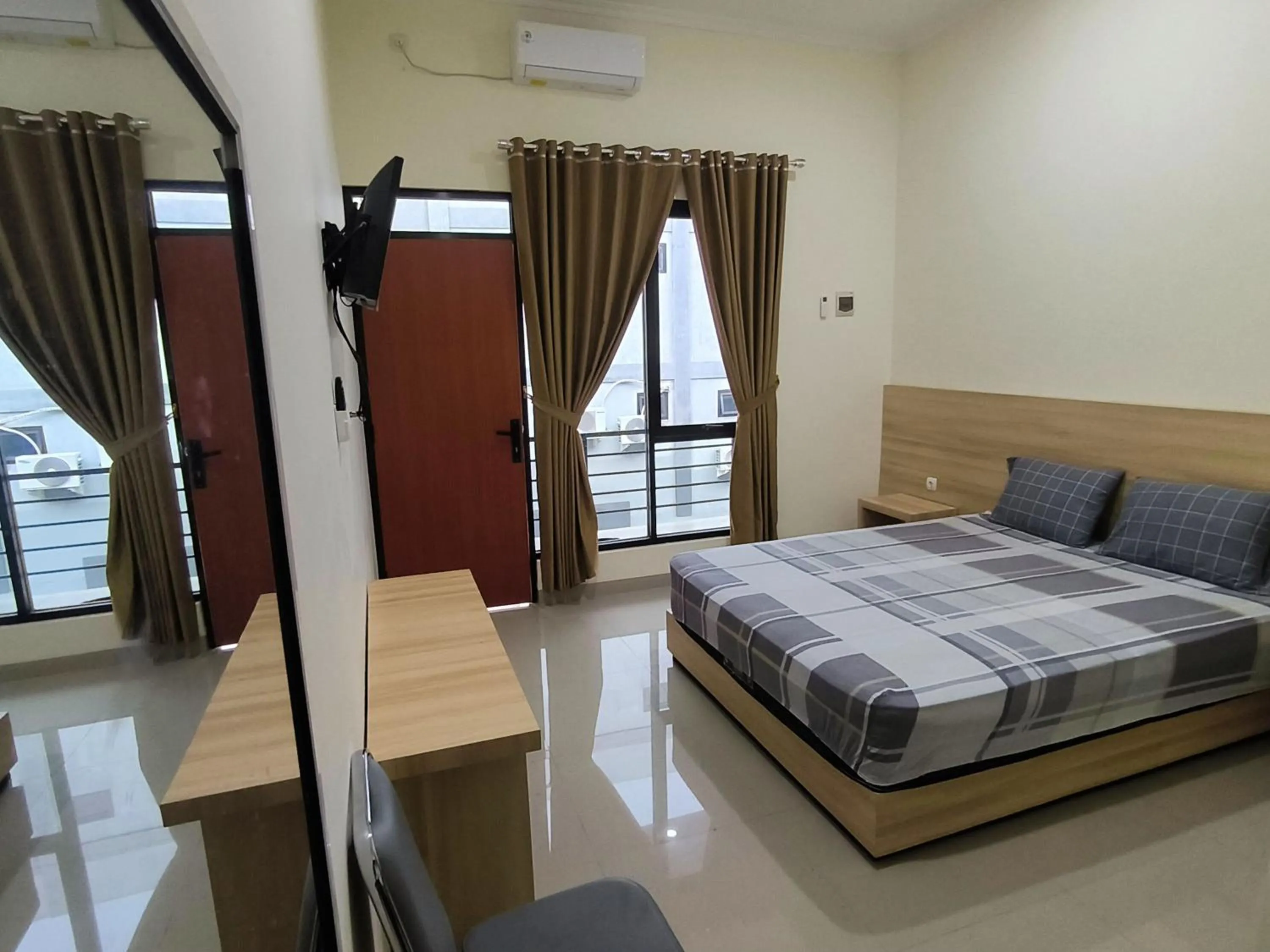 Bed in Tentrem Guesthouse Baru