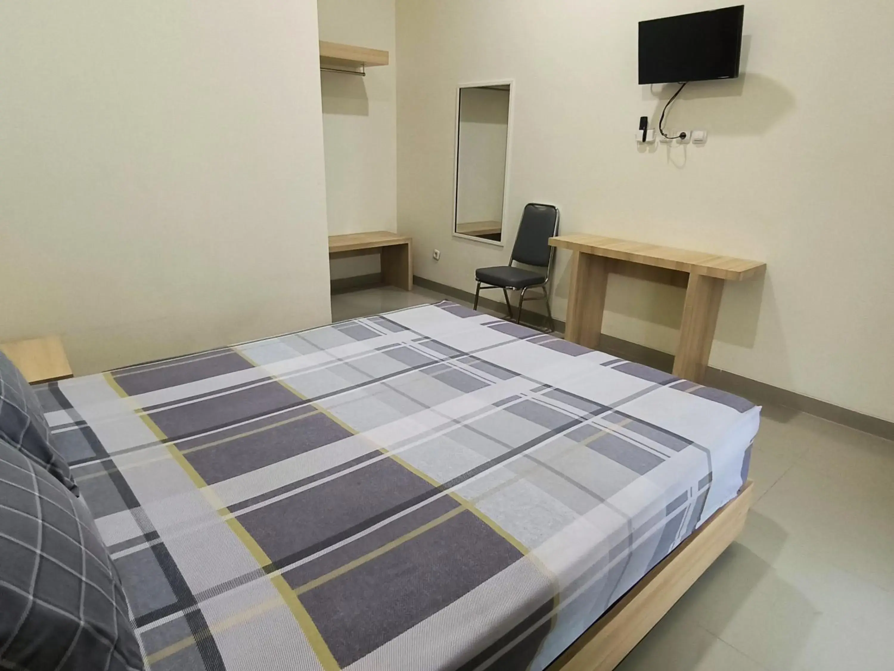 Bed in Tentrem Guesthouse Baru Bed in Tentrem Guesthouse Baru