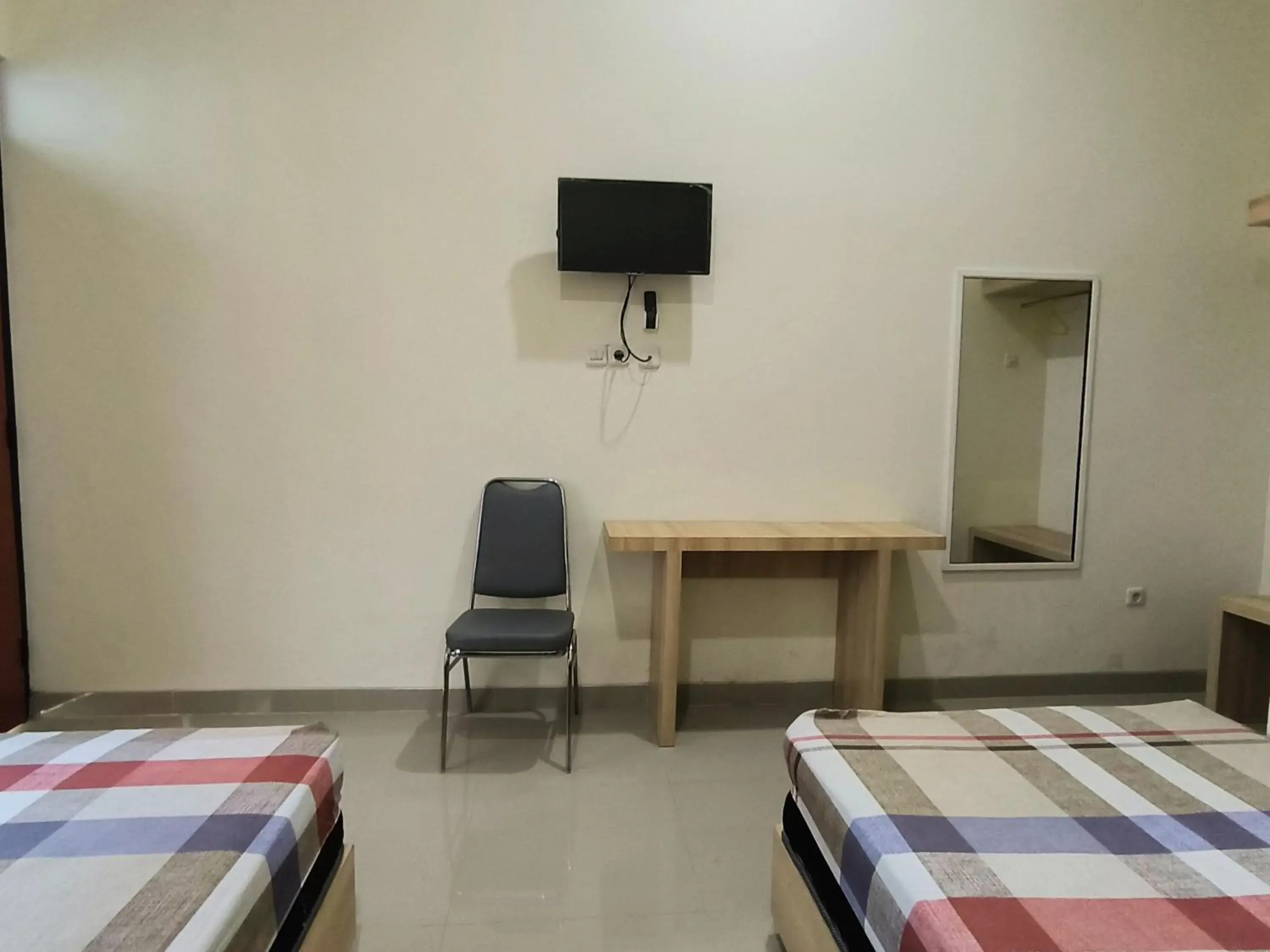 Bed in Tentrem Guesthouse Baru Bed in Tentrem Guesthouse Baru