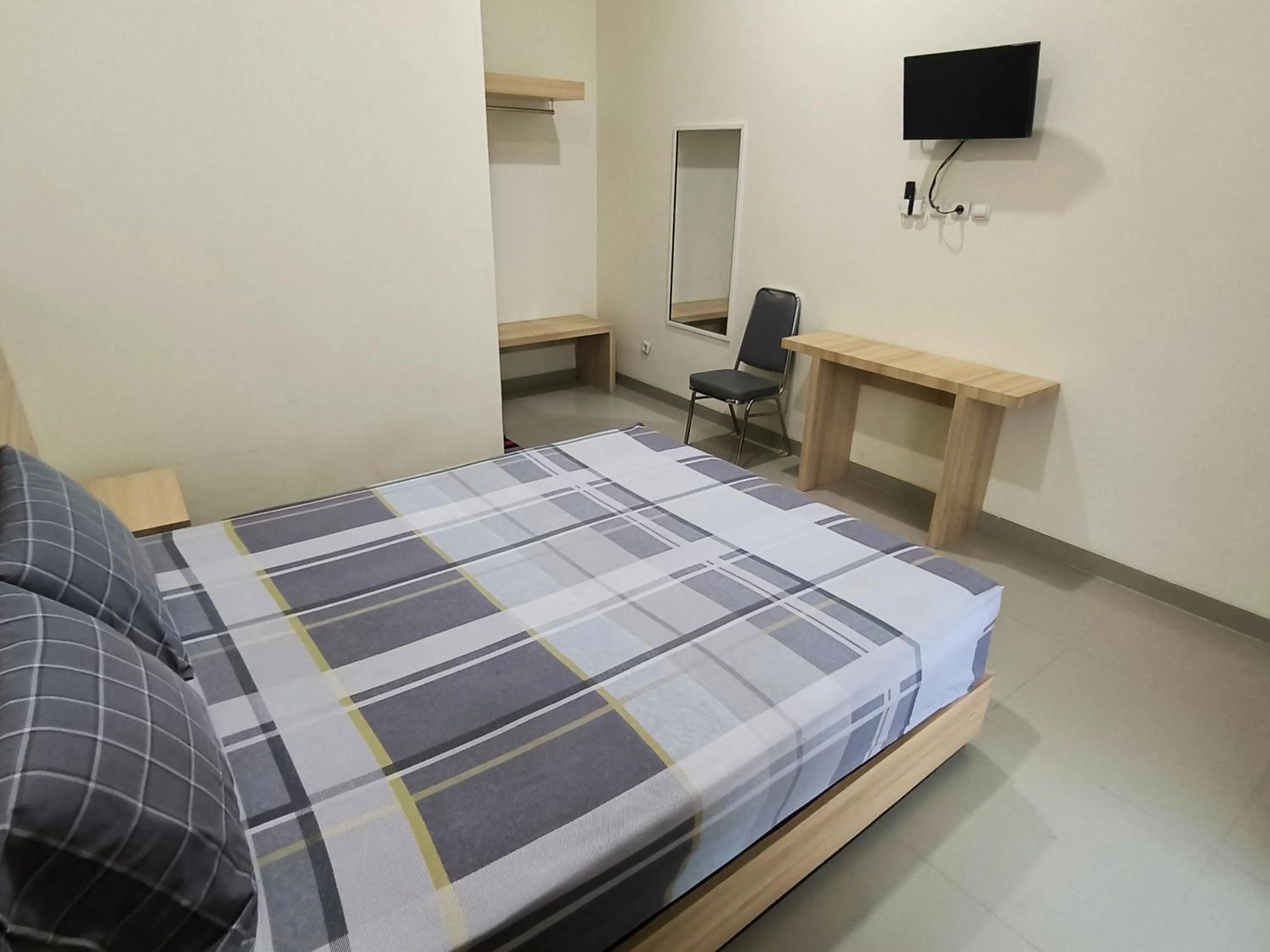 Bed in Tentrem Guesthouse Baru