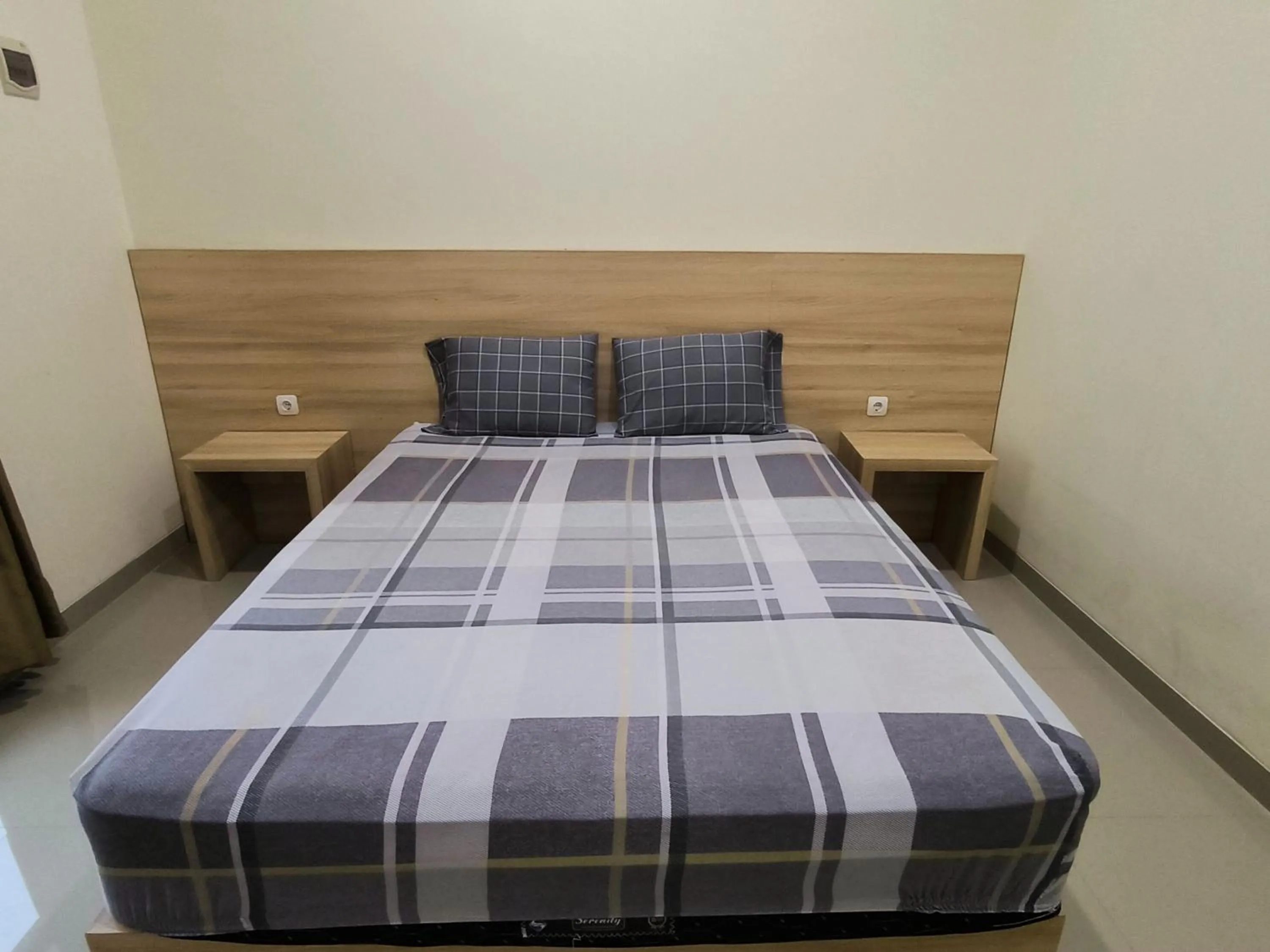 Bed in Tentrem Guesthouse Baru
