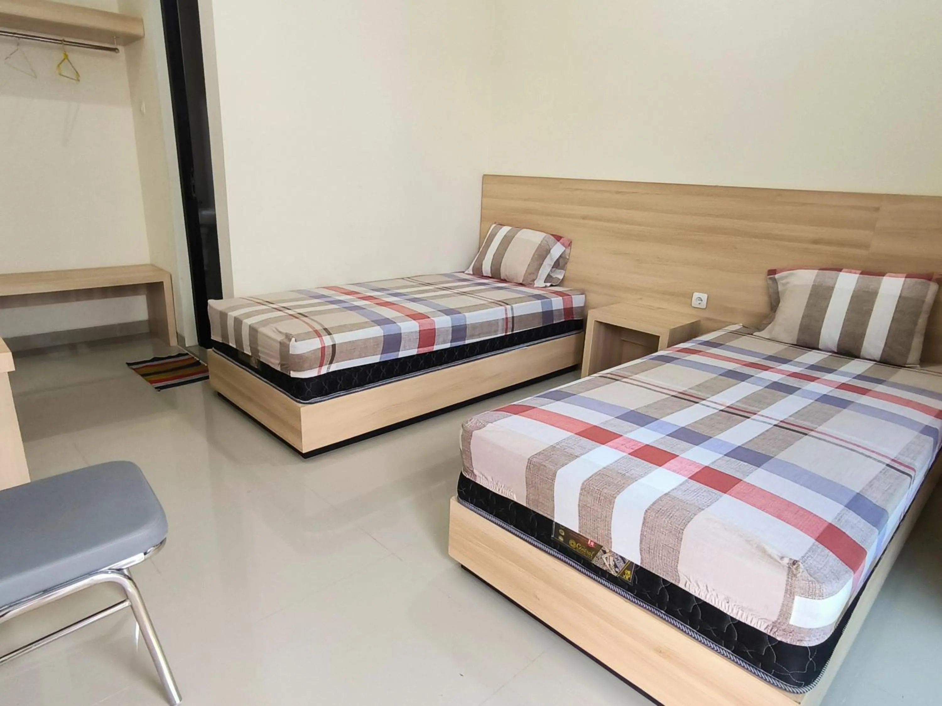 Bed in Tentrem Guesthouse Baru