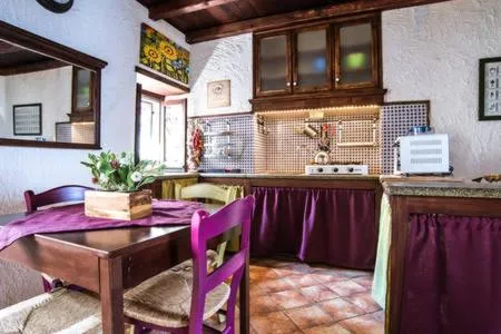 Kitchen or kitchenette in Casa Gisira