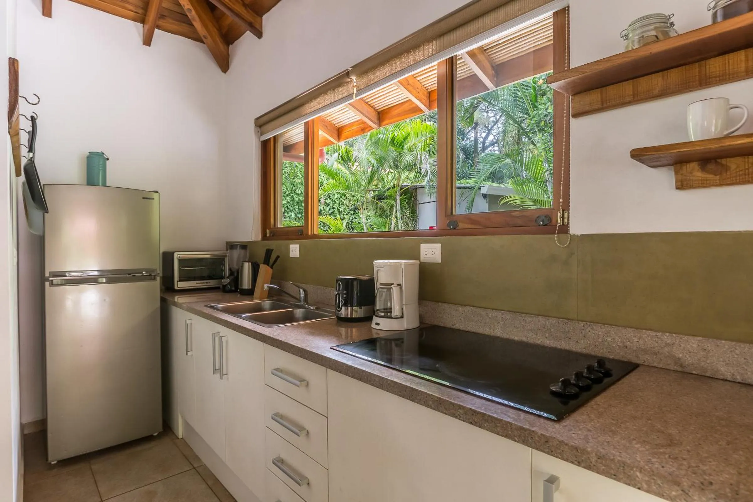 Kitchen or kitchenette in Villas Santa Teresa