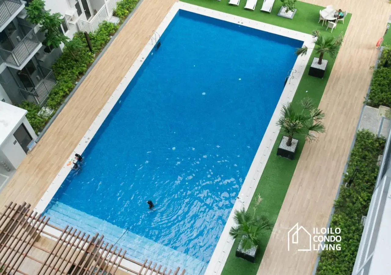 Pool view in Studio apartment with balcony - Iloilo Condo Living Pool view in Studio apartment with balcony - Iloilo Condo Living