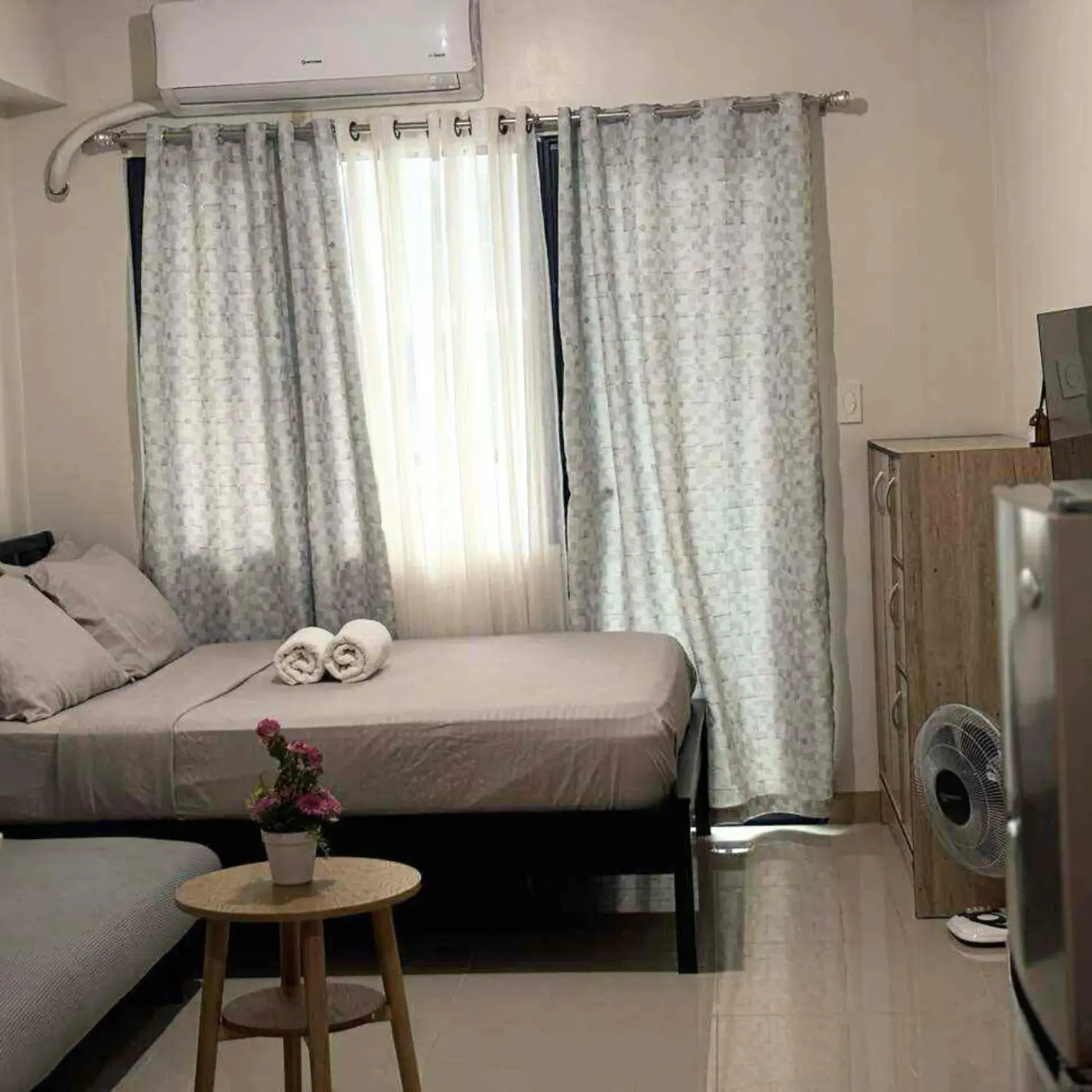Bed in Studio apartment with balcony - Iloilo Condo Living Bed in Studio apartment with balcony - Iloilo Condo Living