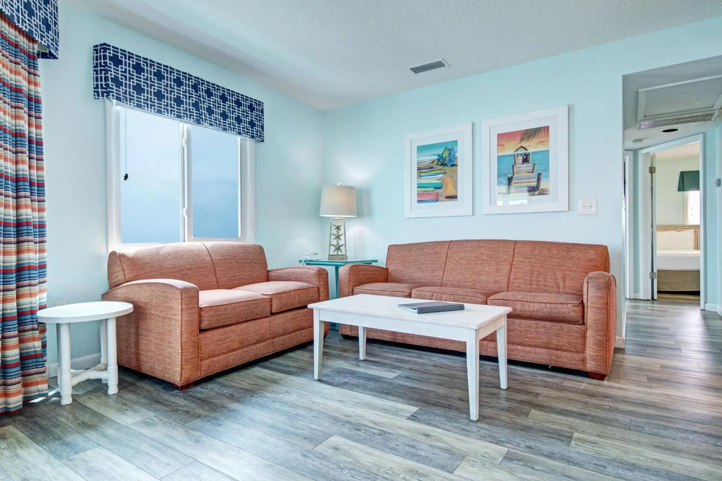 Living room in New Smyrna Waves by Exploria Resorts